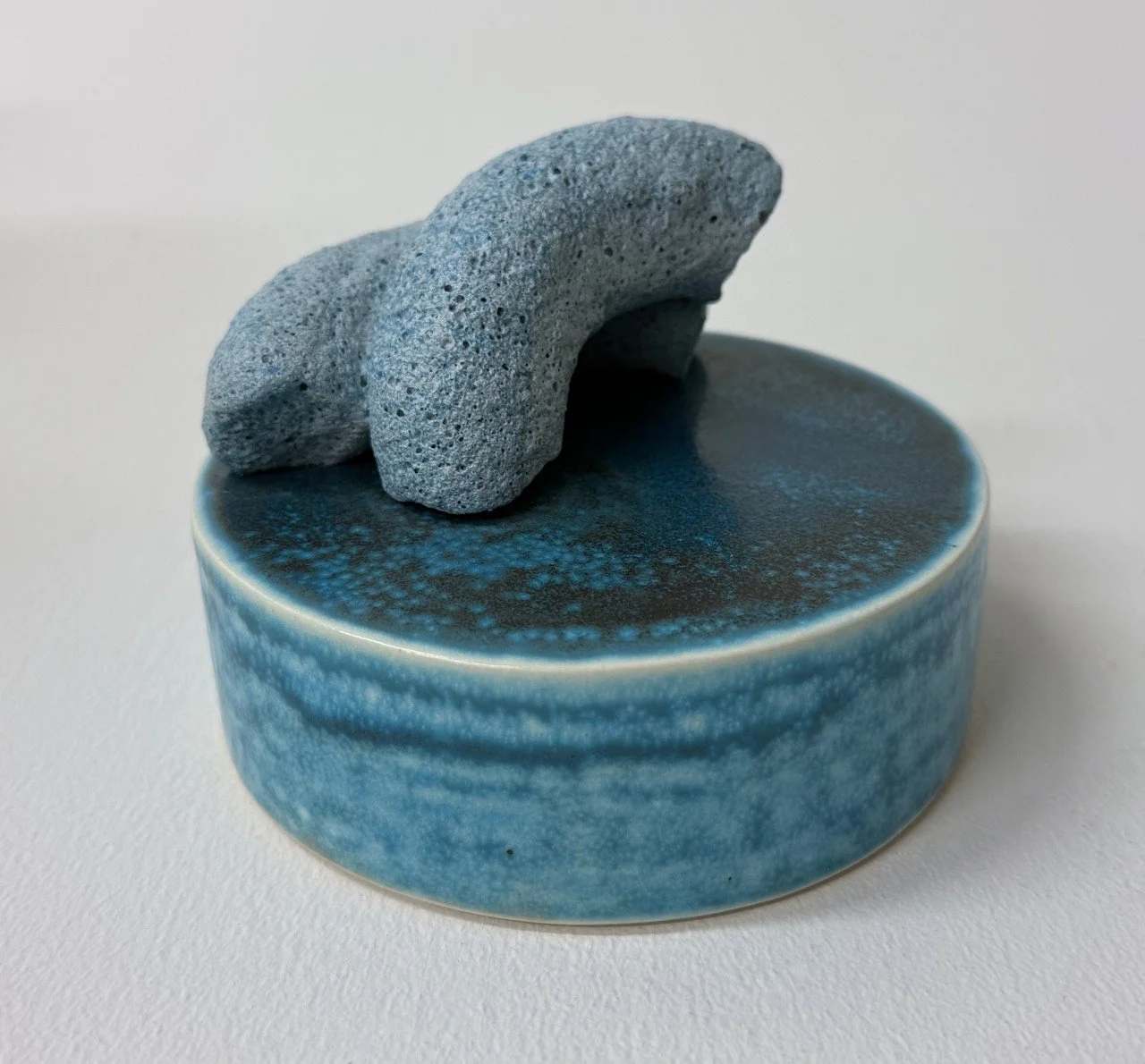 sutter porcelain poof.jpg