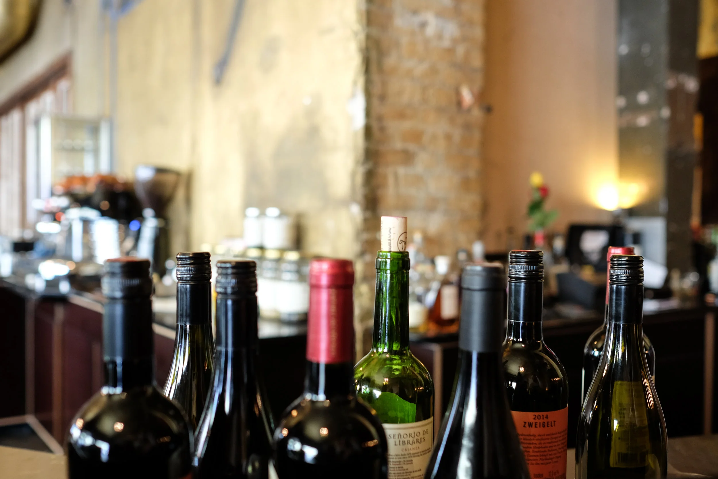 wine bottles lined up.jpeg