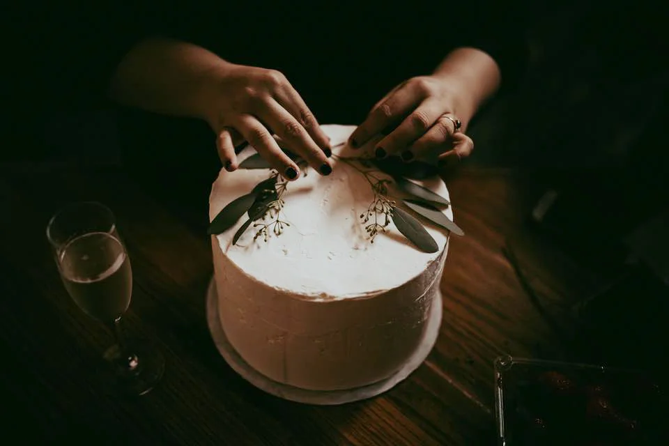 ^ Working in the food and cookbook industry has given Morgan balance while working on deep, social issue-based projects that sometimes require a lot of emotional vulnerability and stamina. Here, she works on a cake she made for a friend’s wedding in September.