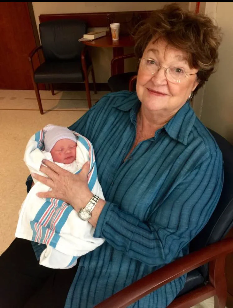 Julia holding her granddaughter, Mary Elizabeth Mobley, in September 2016.