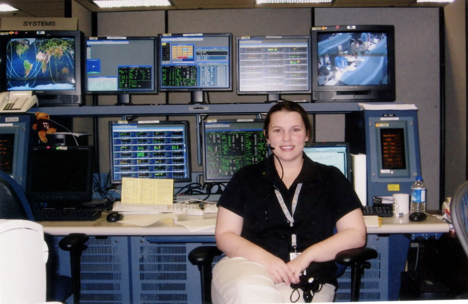 ^ While working for SpaceHab, Marie worked in the Payload Operations Control Center in Mission Control in Houston, Texas. 