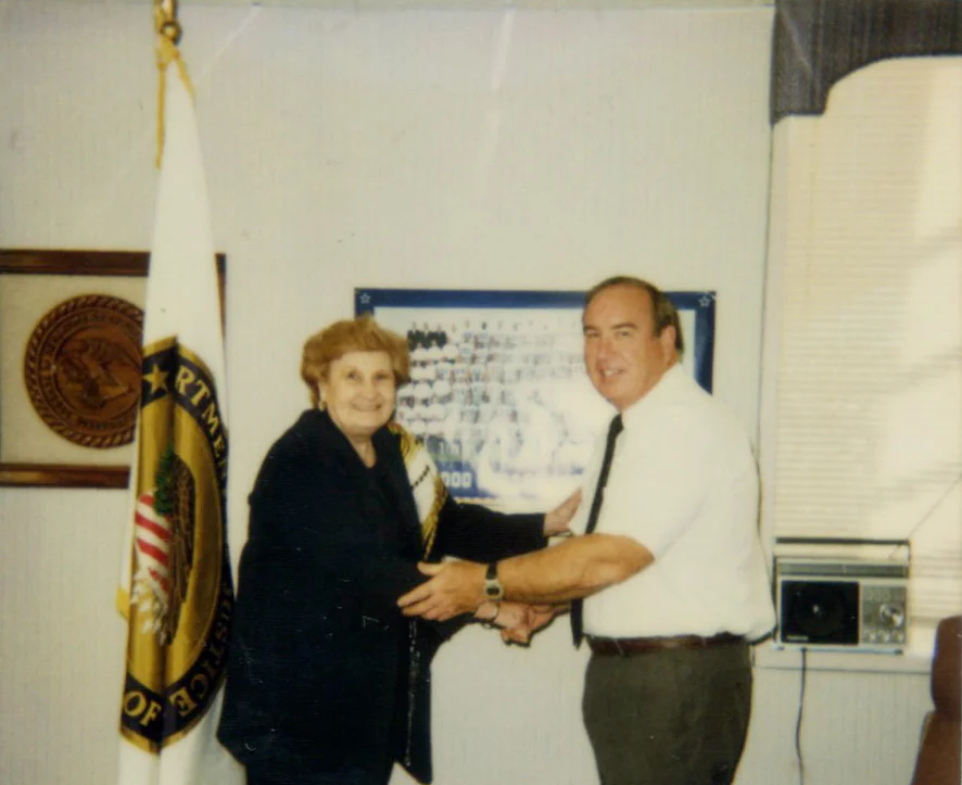 ^ While teaching English as a Second Language at FCI, Mildred was recognized for helping a large class of inmates receive their GEDs.