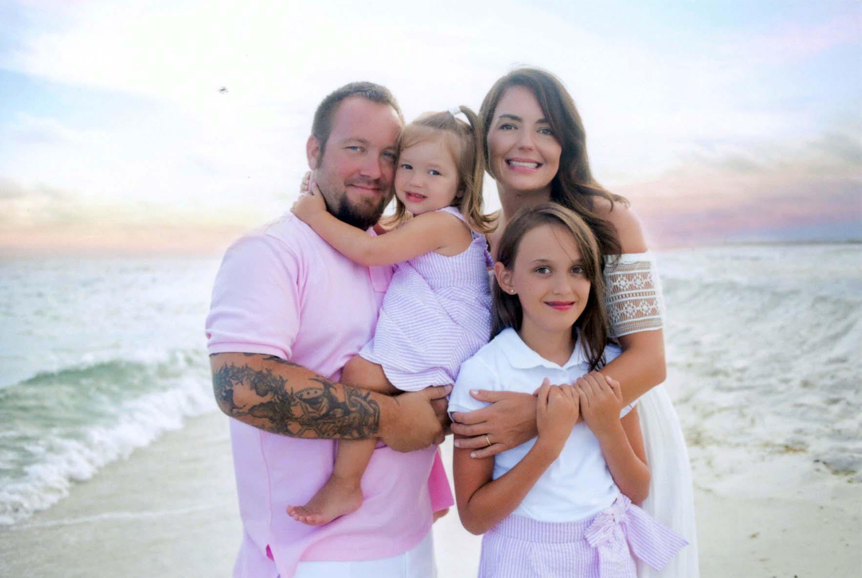 David with his wife, Lorilynn, and their daughters, Alexandria and Gracelynn. (Photo by 615 Photography)