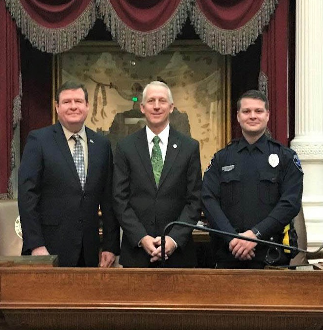 O n January 17, Rep. VanDeaver, presented flags to Todd Fore and Jason Fore in the Texas House of Representatives Speaker’s Dais. Todd had just retired from law enforcement and became a Bowie County Justice of the Peace. His son, Jason, had just completed training to become a member of law enforcement in South Central Texas. Rep. VanDeaver presented them both with flags flown over the Texas Capitol to commemorate the bookends of one family’s commitment to law enforcement and serving the public. (Photo by House Photography)