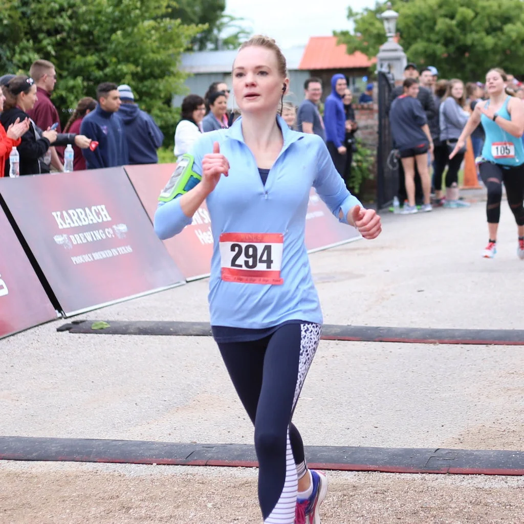 Hadley finishing a half-marathon in April 2018.
