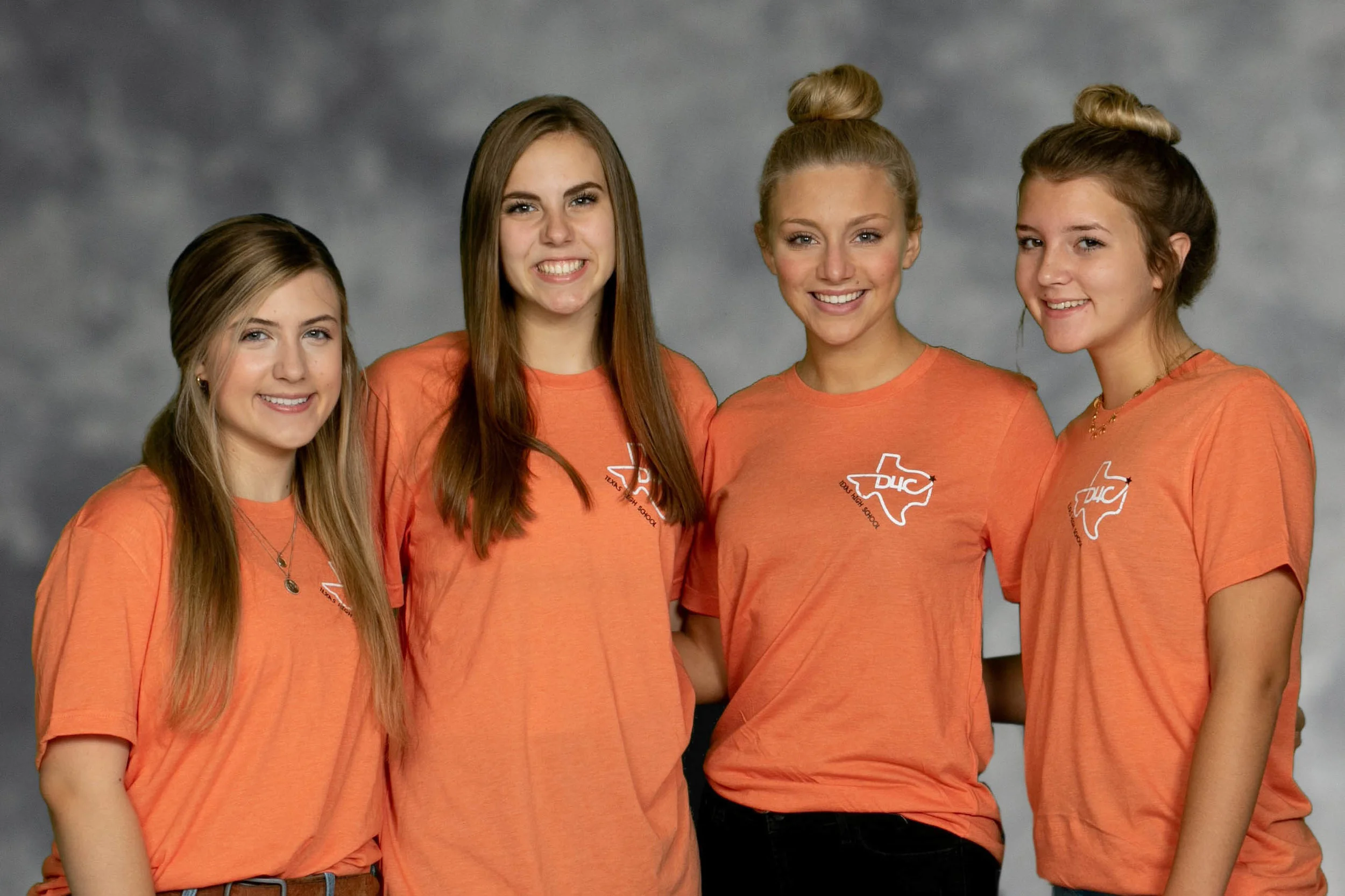 Dash 4 Cash Student Co-Chairs Meredith Green and Olivia Lower and Underwriting Co-Chairs Hollan Borowitz and Emma McMillen wear the new T-shirts which are being used to promote this year’s Dash 4 Cash Scholarship Run.