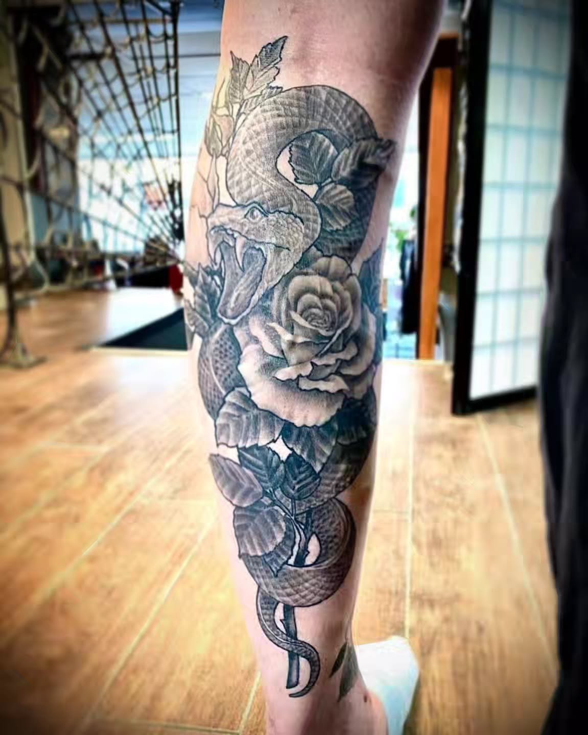 🐍🌹 Snake &amp; Rose 🌹 🐍
Big ol' calf piece by &bull; @keithmullintattoos &bull; 
I think this placement might be one of my favourites!
.
.
.
Raven's Head Tattoo 
242 Dundas Street 
London Ontario 
519-601-2400 
.
.
#ldnont #londonontario #snaketa