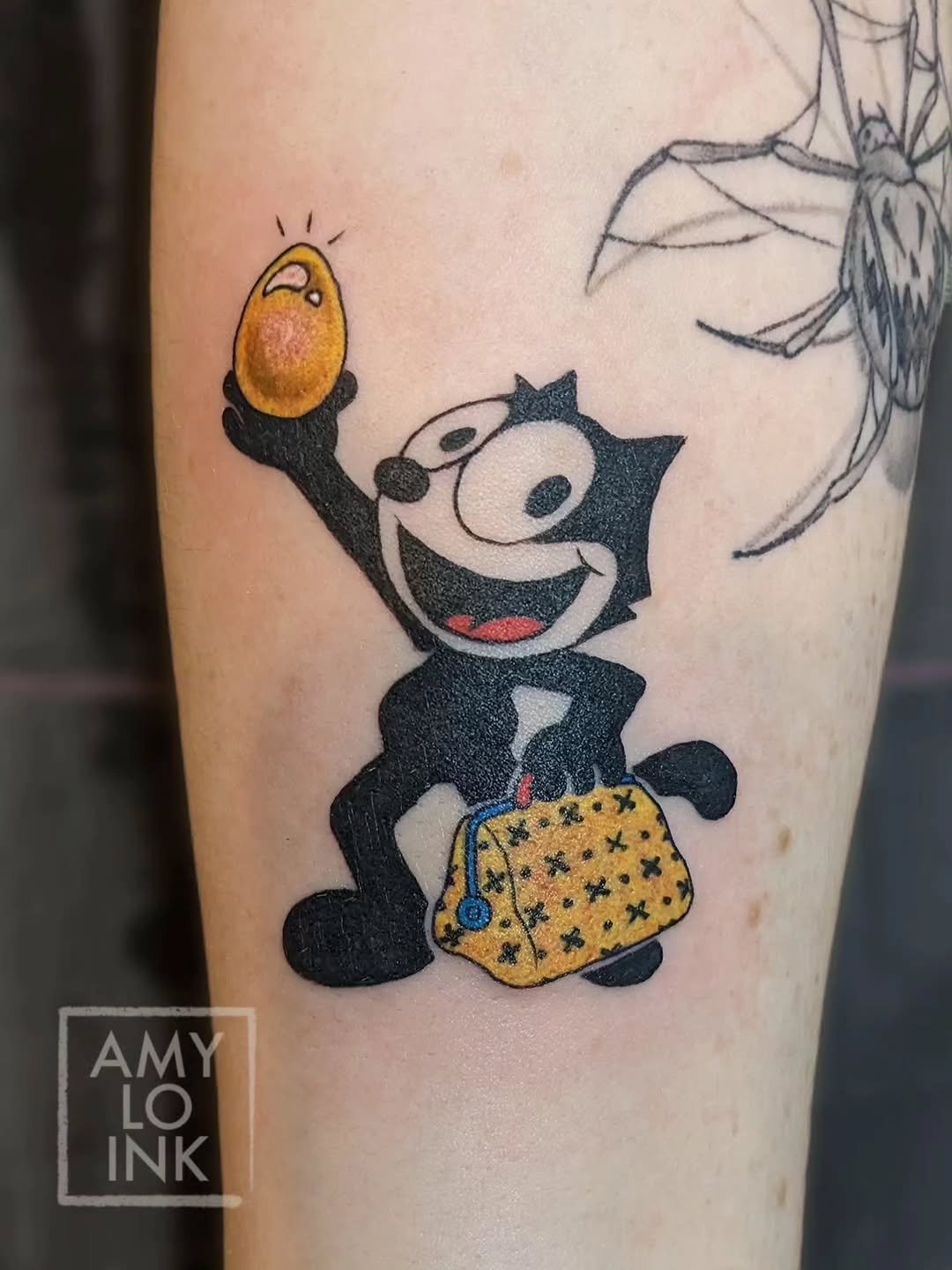 &bull; @amy.lo.ink &bull;  Have you ever given a cat an egg? This was my first time, I think he liked it a lot. You should try giving your cat an egg today and see if they like it. 😺❤️🥚 

This was a really fun tattoo to do! I love getting to tattoo