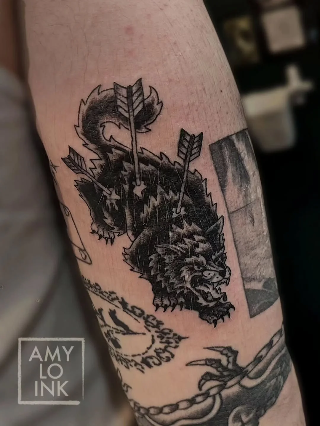 @amy.lo.ink He will die before he moves and shows you what he's covering up! 😡🐺 

I think this is my first time covering up one of my own tattoos! The fine line design is most likely well over a year old now, and it just didn't fit my clients vibe 