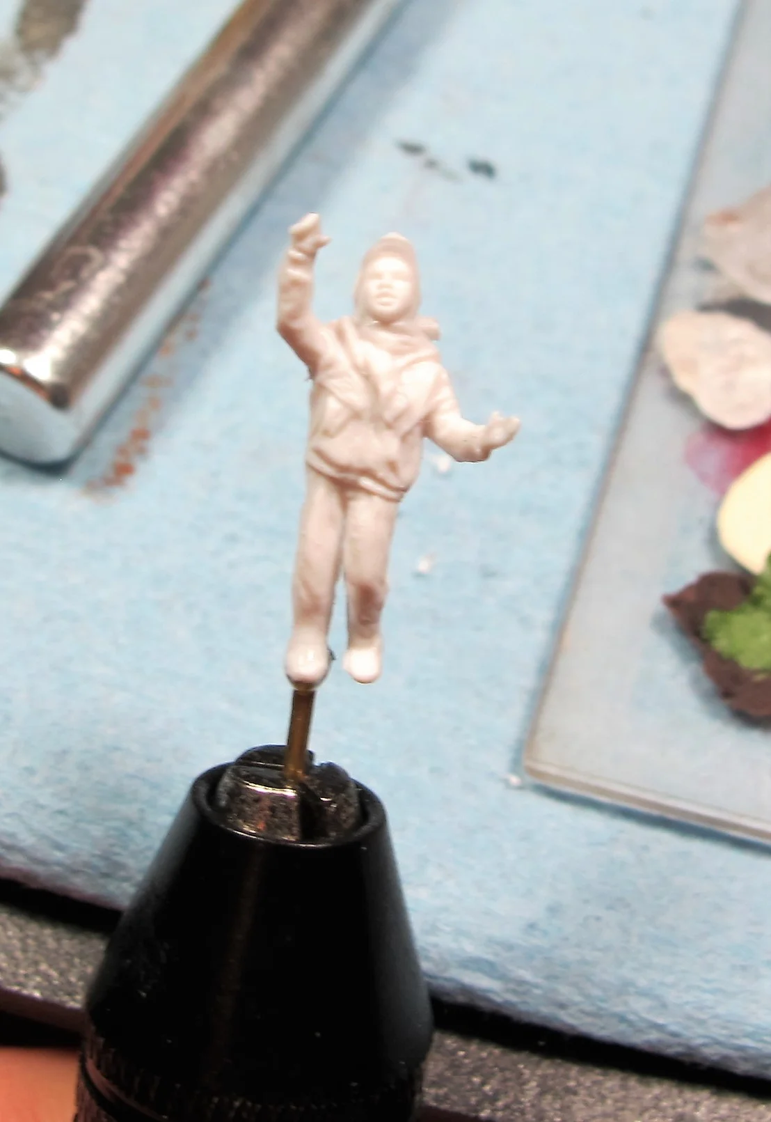 Now the miniature is secured in the same pin vice you used to drill your hole. I will use this pin voice as my handle for painting this figure from here on out.