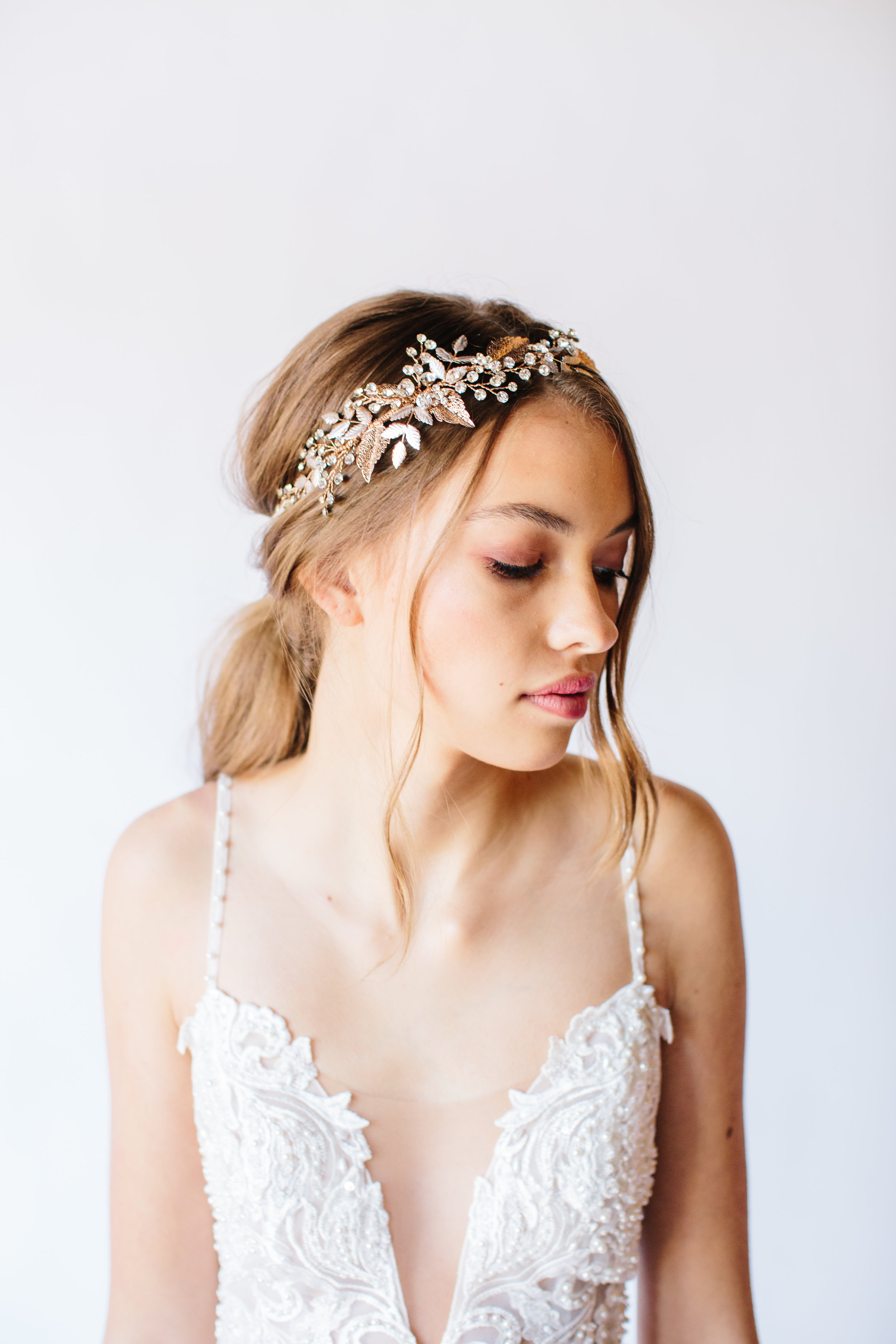 Bridal comb with hand-painted flowers with opal centers by Untamed Petals