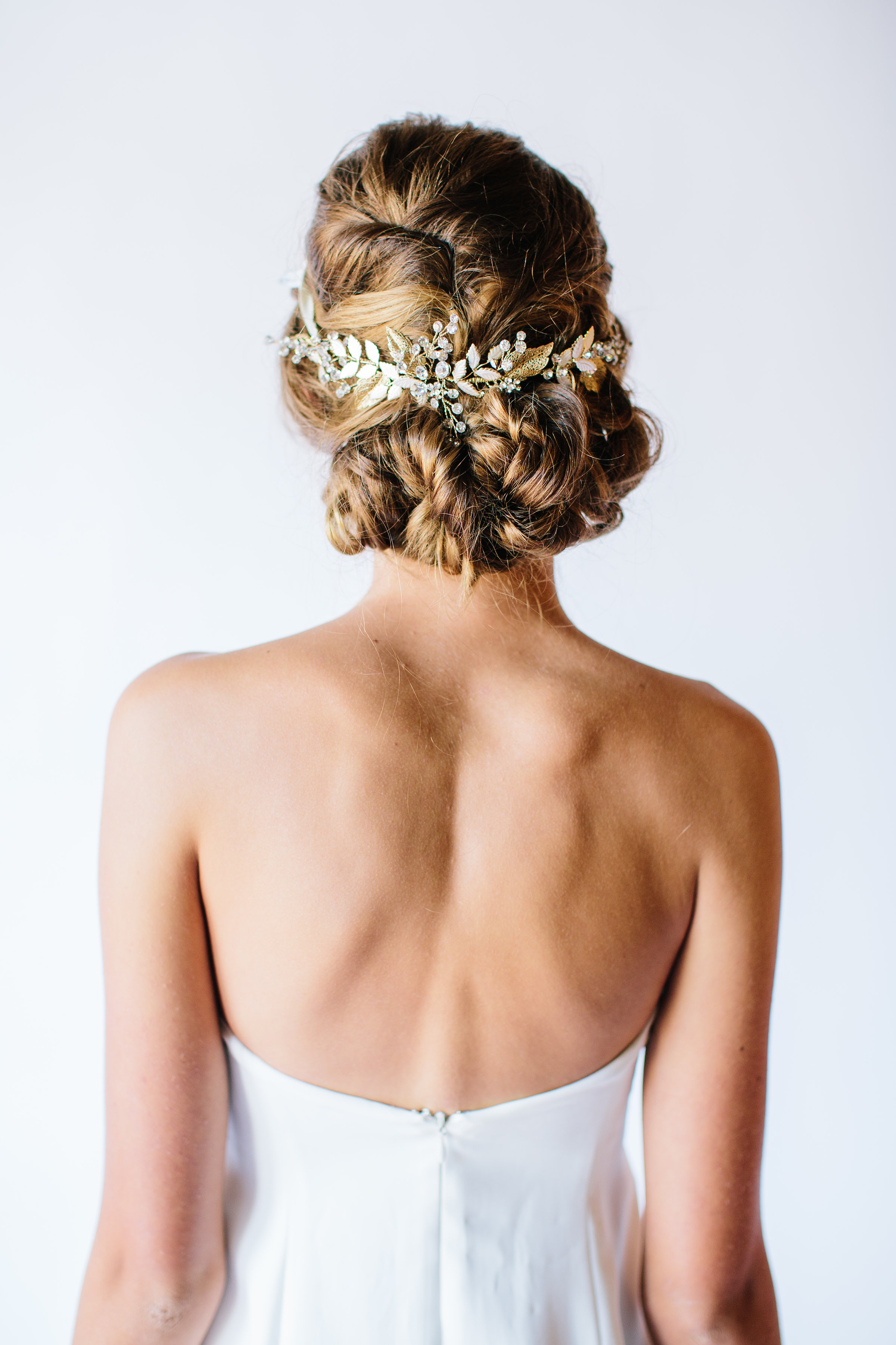 Bridal comb with hand-painted flowers with opal centers by Untamed Petals