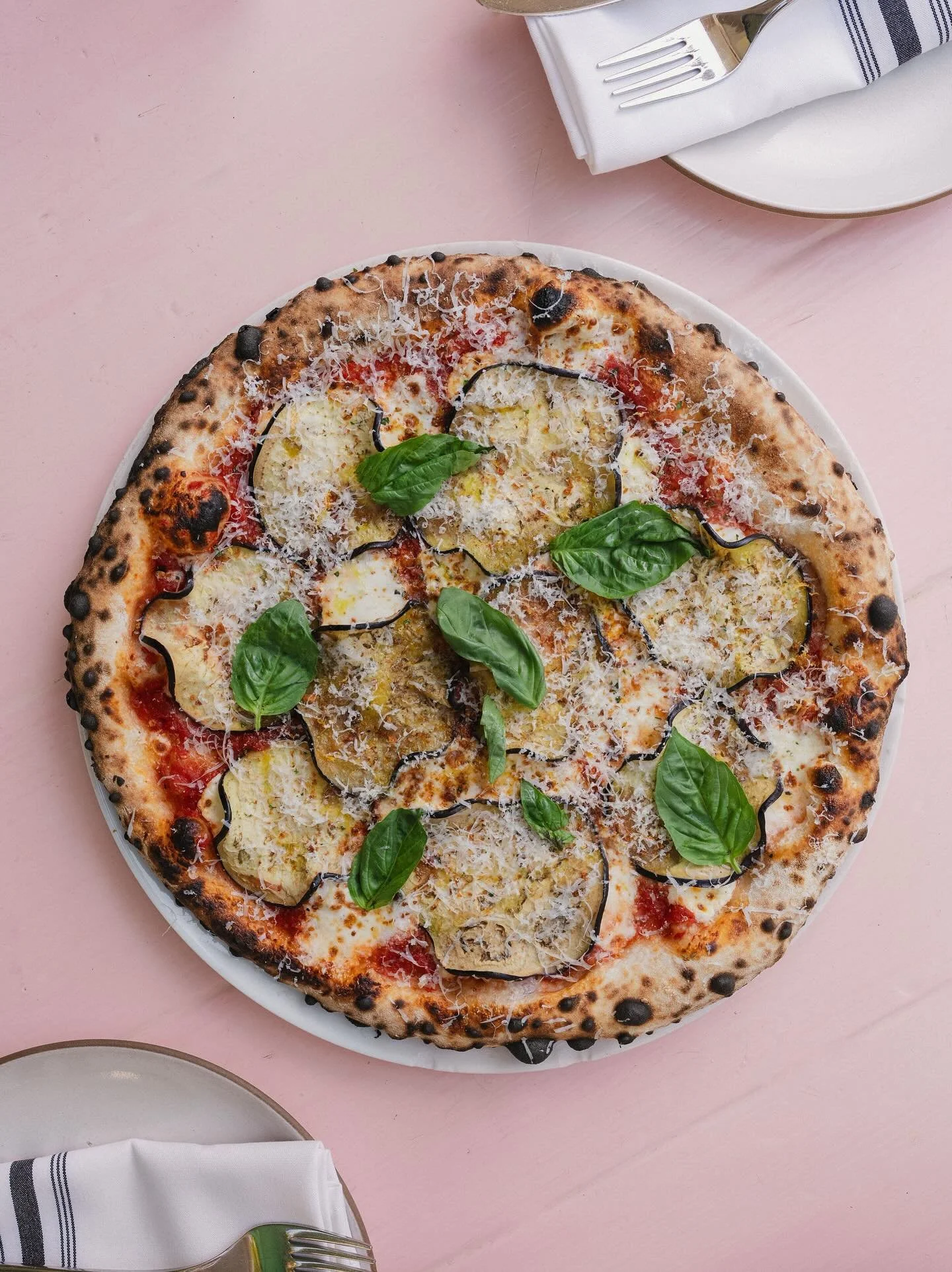 Very nice to have @carterhiyama back in house to take some always gorgeous food photos. 

Eggplant is on the rise so @oscar_desantiago_ has got it coming for you in several ways. First, in the form of this stellar pizza, a play on eggplant parm. It&r
