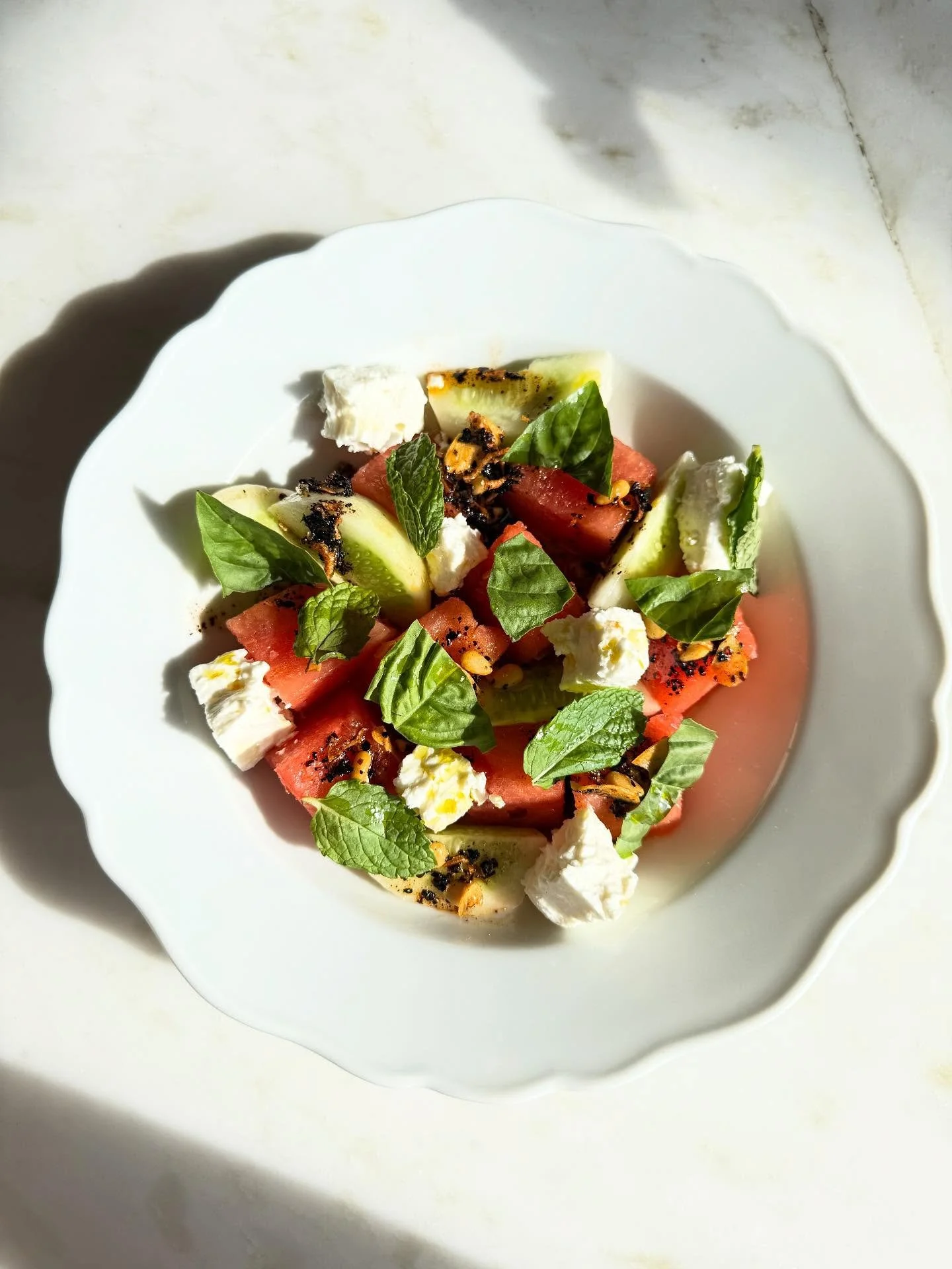 Last few days of this insanely delicious and juicy watermelon salad. Come get it while it&rsquo;s still hot out! Munak watermelon, Essex Greek feta, @cosechafarming lemon cucumbers, and an @burlapandbarrel Urfa chili crisp that should be bottled 🤪 r