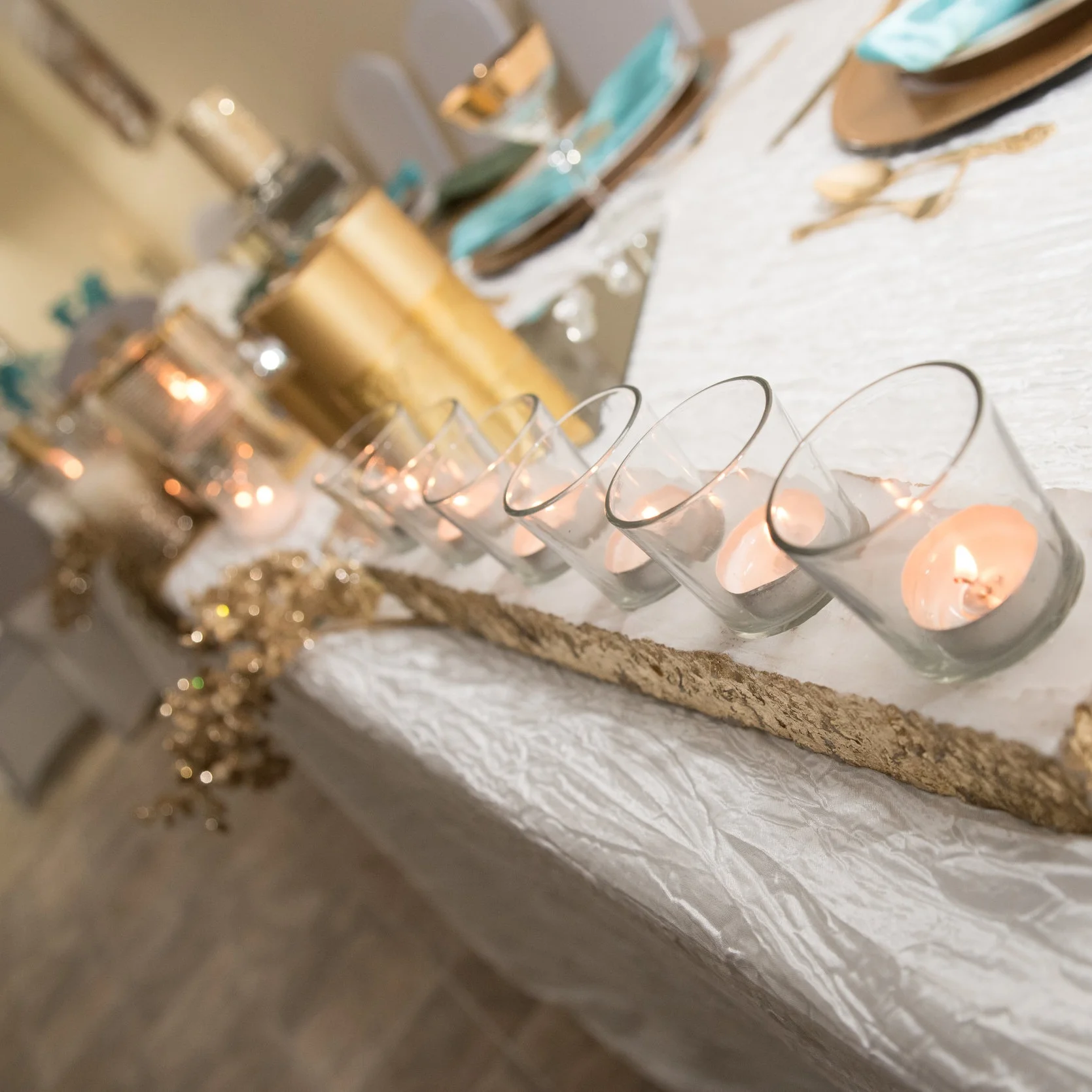 CLEAR VOTIVE HOLDERS Perfect for creating a soft ambiance at your next event. Contact us for pricing & availability