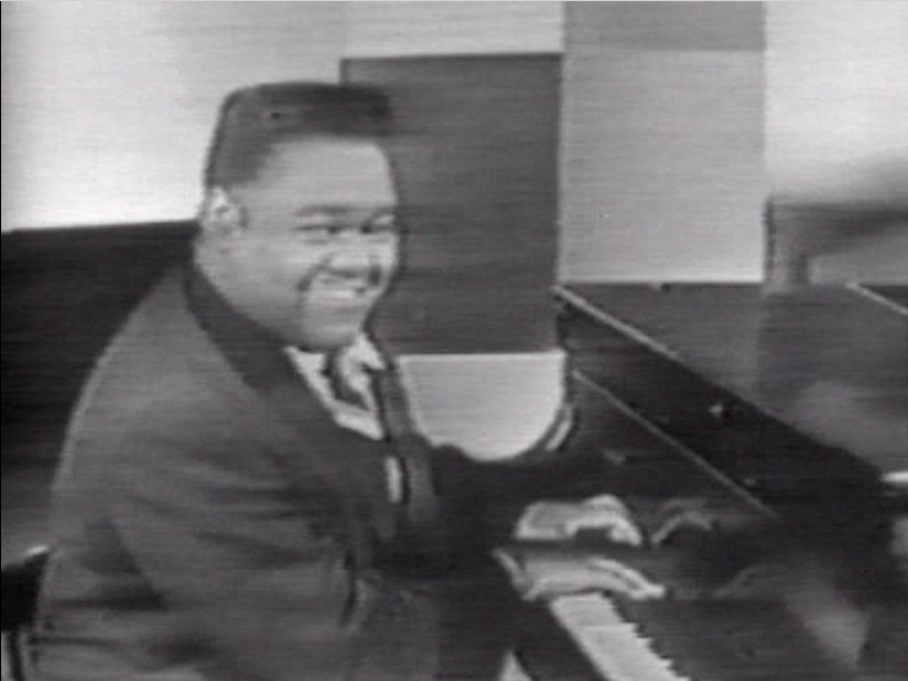 fats domino at piano 1950s.png