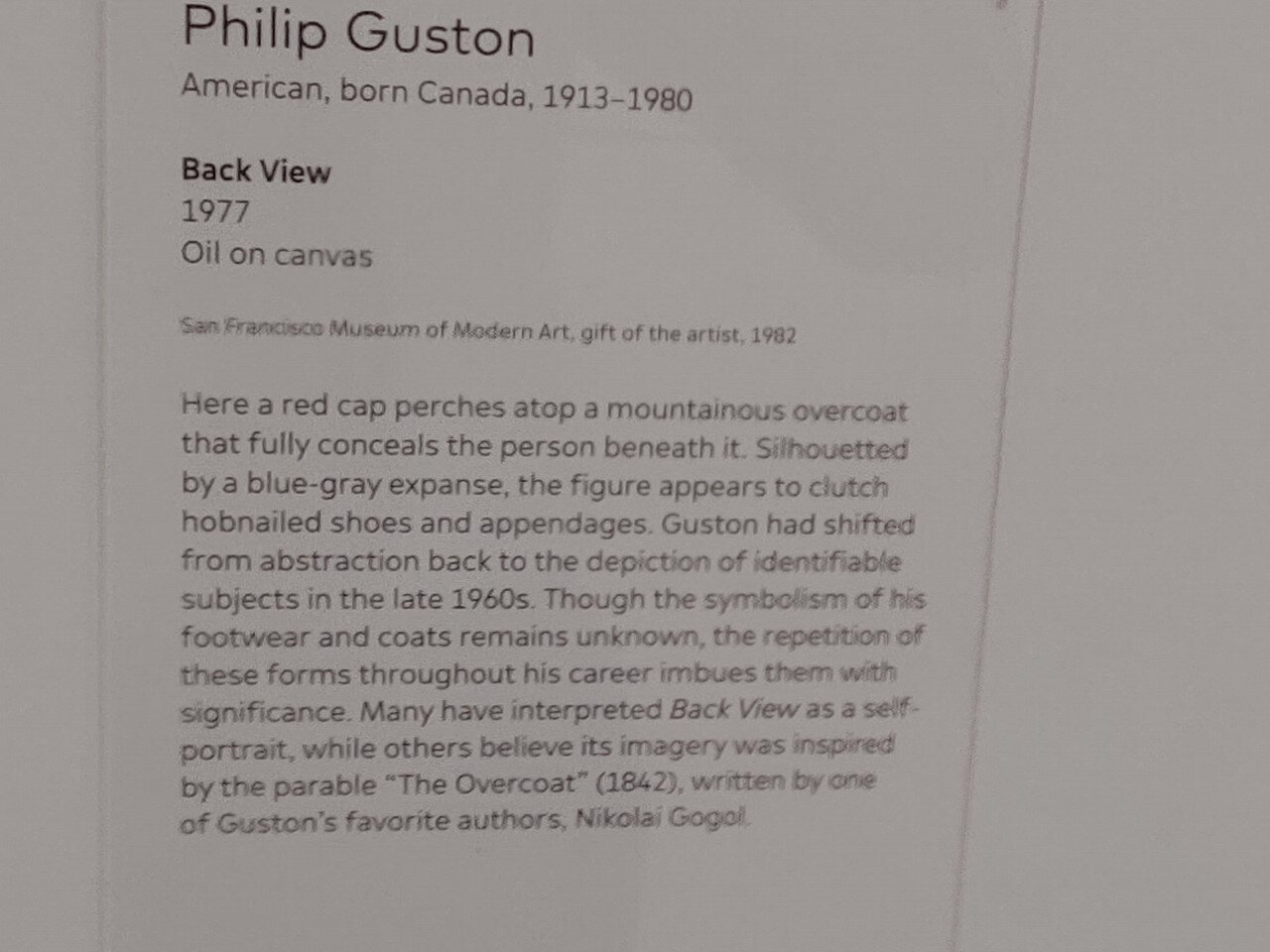 sfmoma guston placrad back view red cap on top.jpg