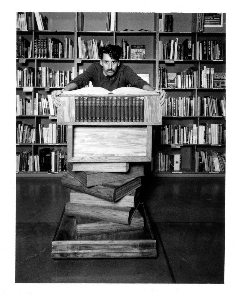 When cool backdrops are already present in your setting, use them! (Photo by Jason Kelley, at Powell’s Books 2012)