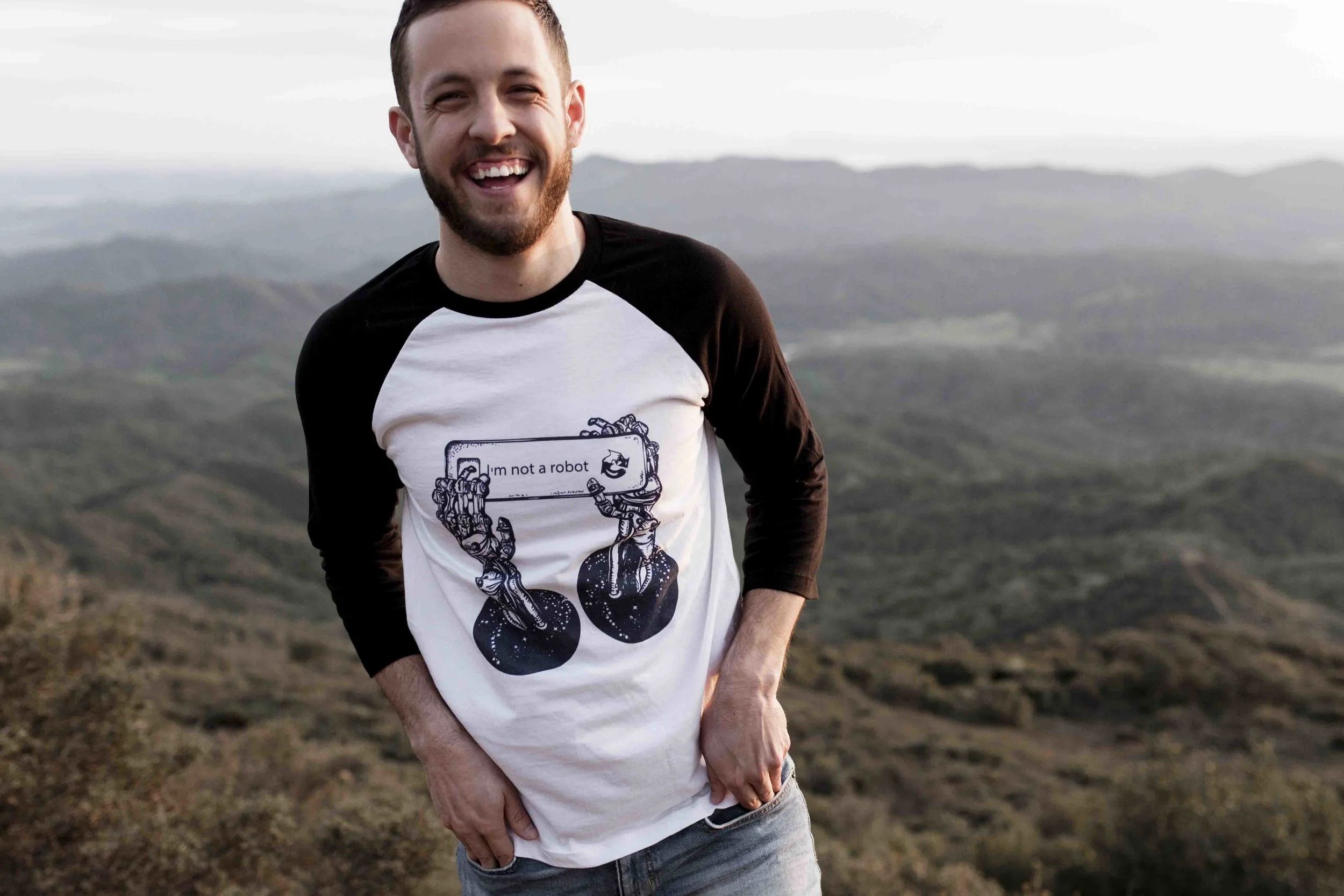 model wearing robot shirt on mountain