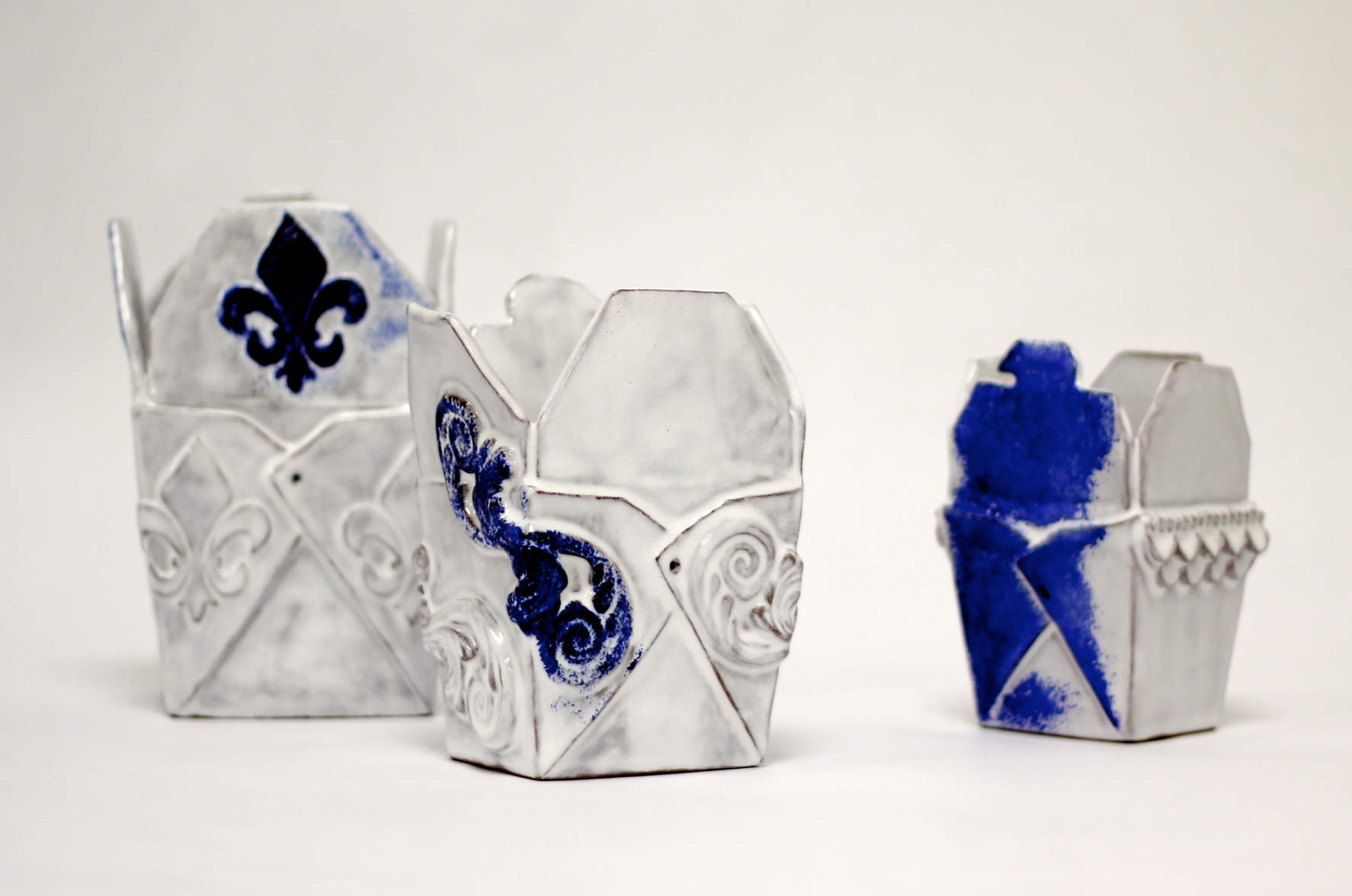 Across the Ocean Project: Travel Experiences, 2016, earthenware, tin-glazed with blue painted decoration 4.5”x3.25”x6.5”/4”x3”x5.5”/3”x2.5”x4.5” 