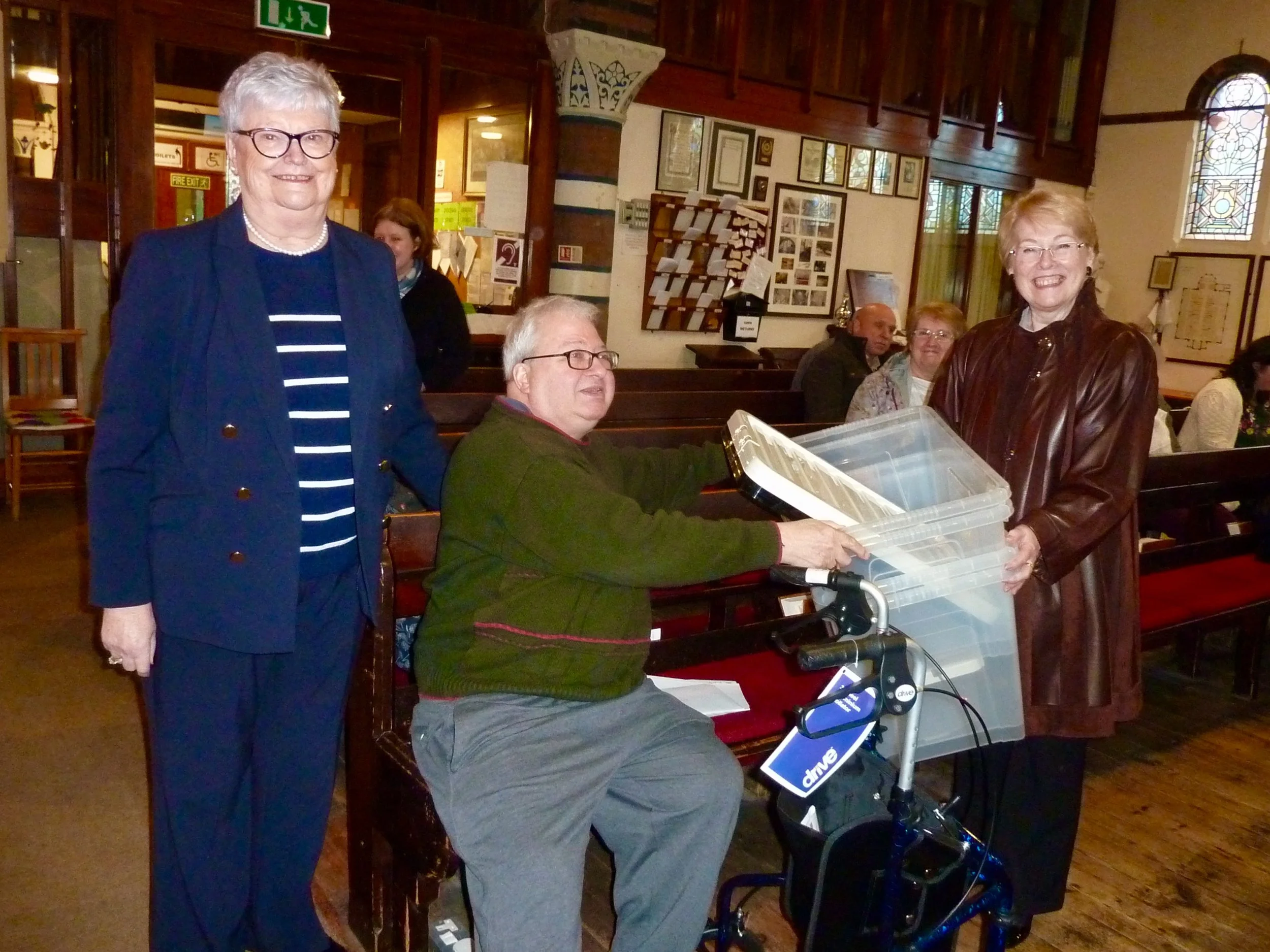 Pete being presented with ‘Thank You’ gifts, from Carol and Sheila, on behalf of St. Anne’s Church.