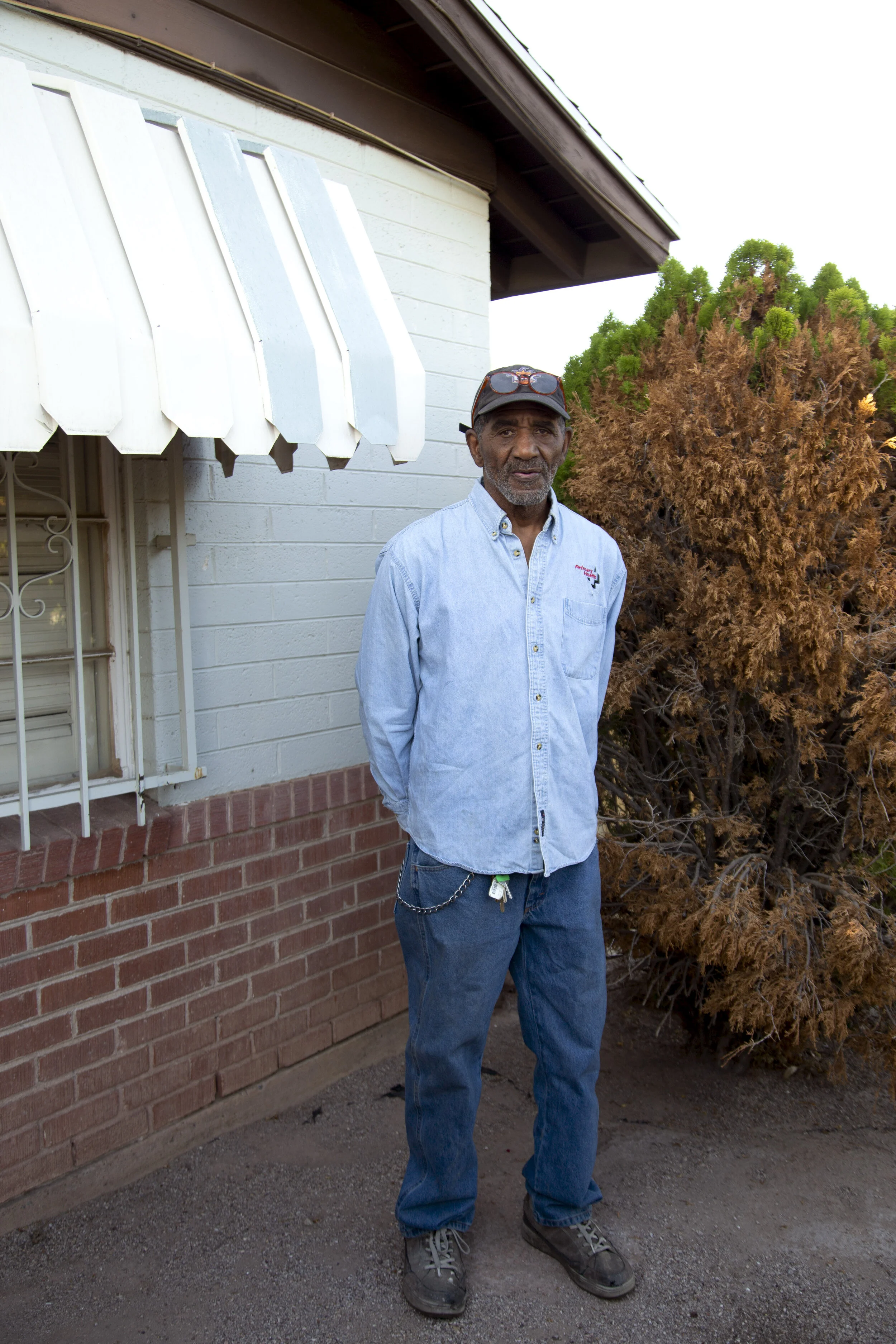 dad standing in front of house.jpg