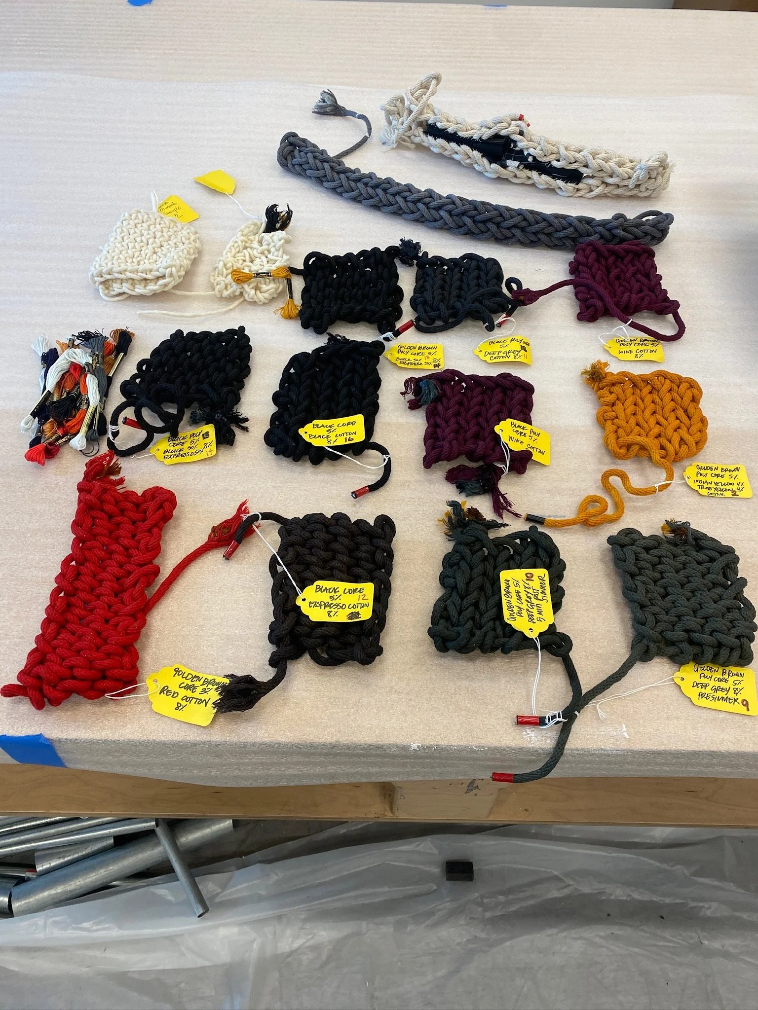  The rope was dyed in sections of orange, red, black, white, and grey. 