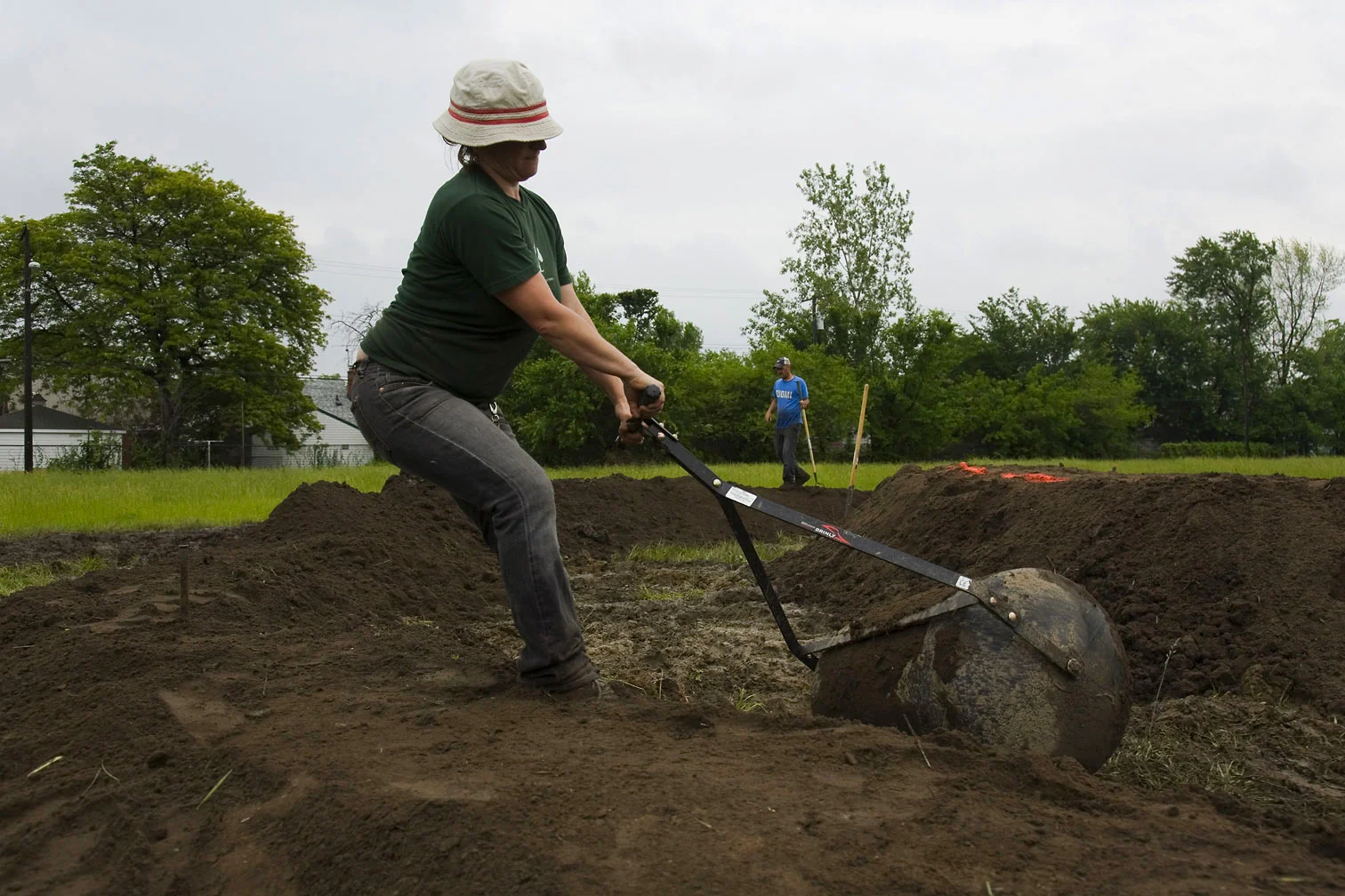 Detroit artists work on a publicly funded landscape installation in Calimera Park - 2010