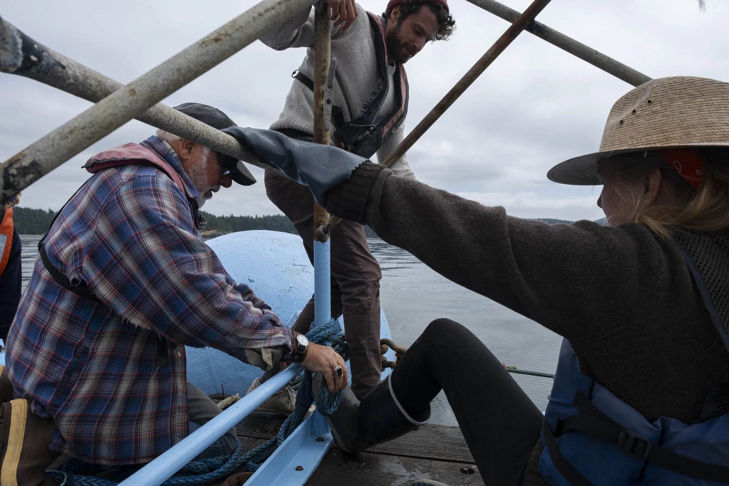 A crew works to get their gear ready for the salmon season.