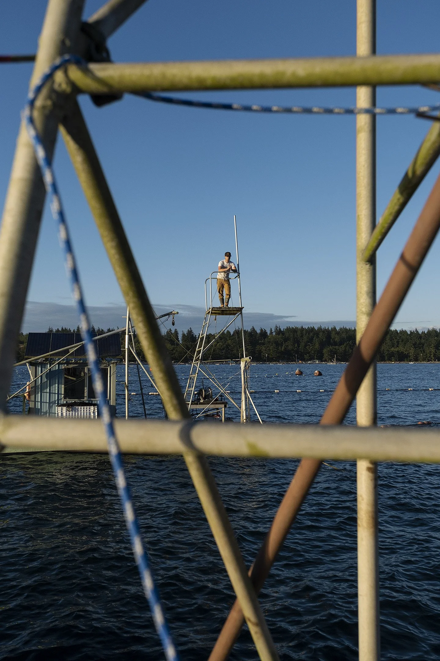 Johnny watches for fish from one of the gear towers.