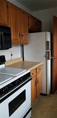 Other side of kitchen - 2021.png