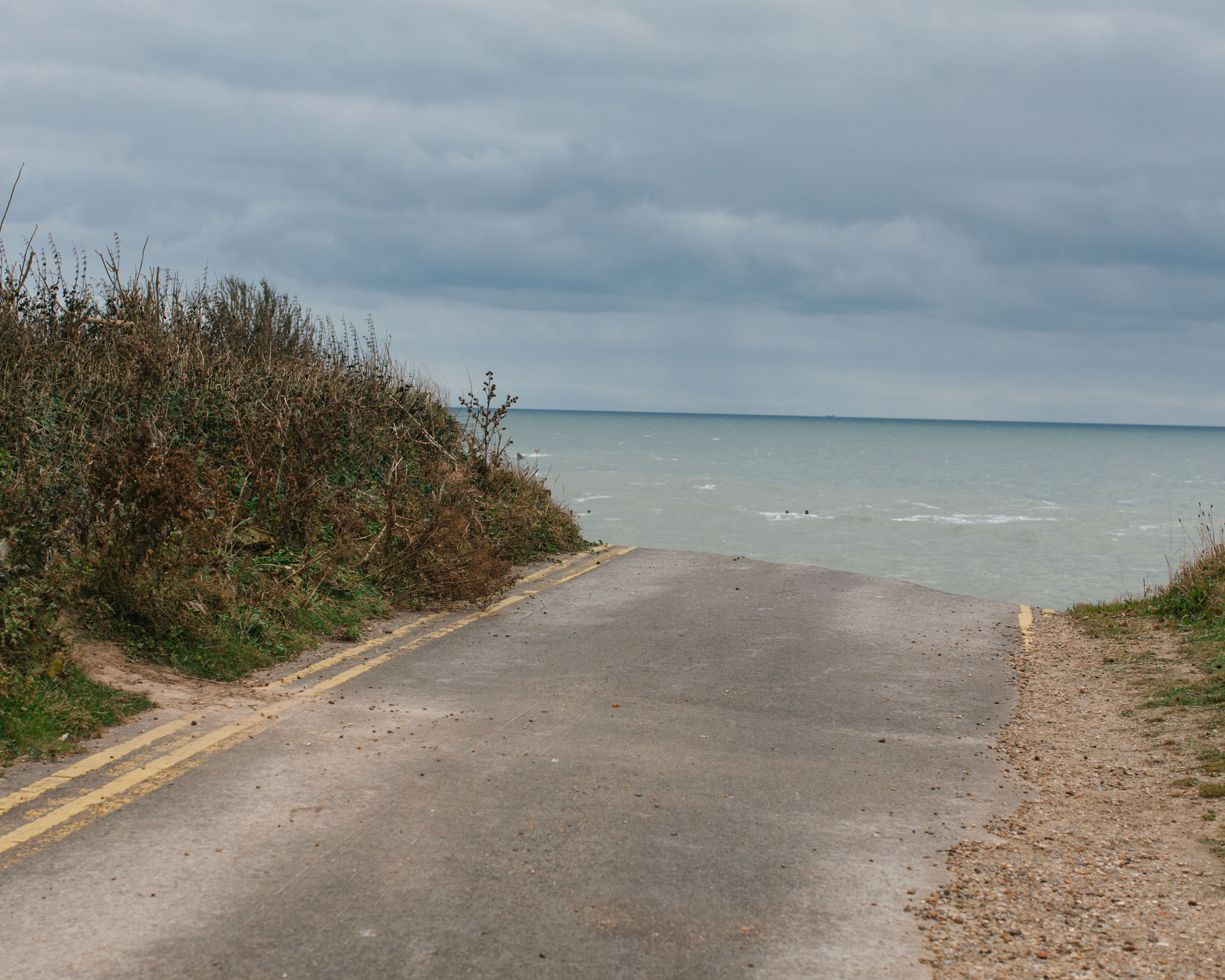 Road to nowhere. Not surprisingly, the common perception of people in this part of Norfolk seems to be one of abandonment—of bureaucrats ensconced in the warm and dry of Whitehall, fiddling while communities flood. People know they can’t stop the sea. They know that living with the threat of storms and surges is part and parcel of choosing to lay your hat on the most dynamic coastline in Europe. 