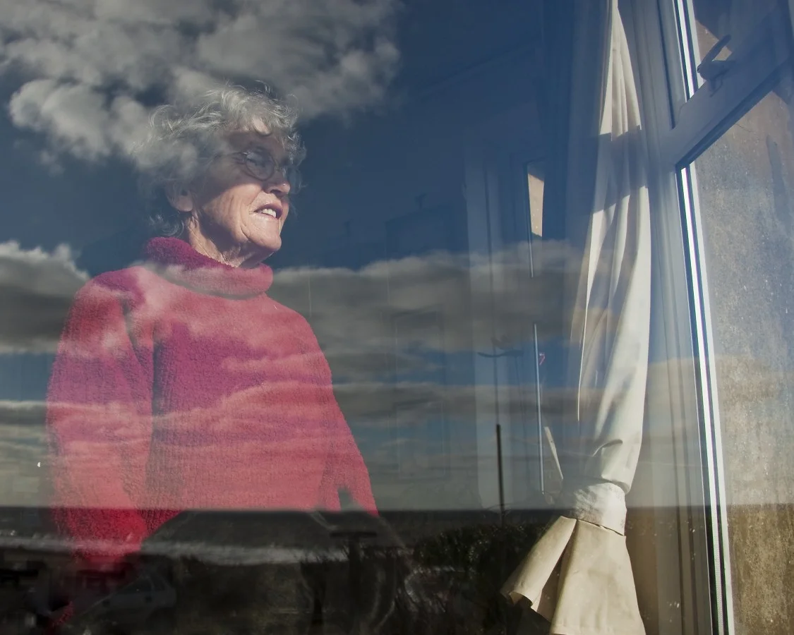 Mrs Boggis gazes out her sea facing window in Easter Bavents, Suffolk. Deprived of fresh supplies of sediment drifting down from the north, the cliffs of Easton Bavents erode fast. At the base, waves launched a devastating offensive, whipped up by the North Sea’s notorious winds, while at the top of the cliffs Suffolk’s soft, spongey clay proved helpless in the face of percolating rainfall. 