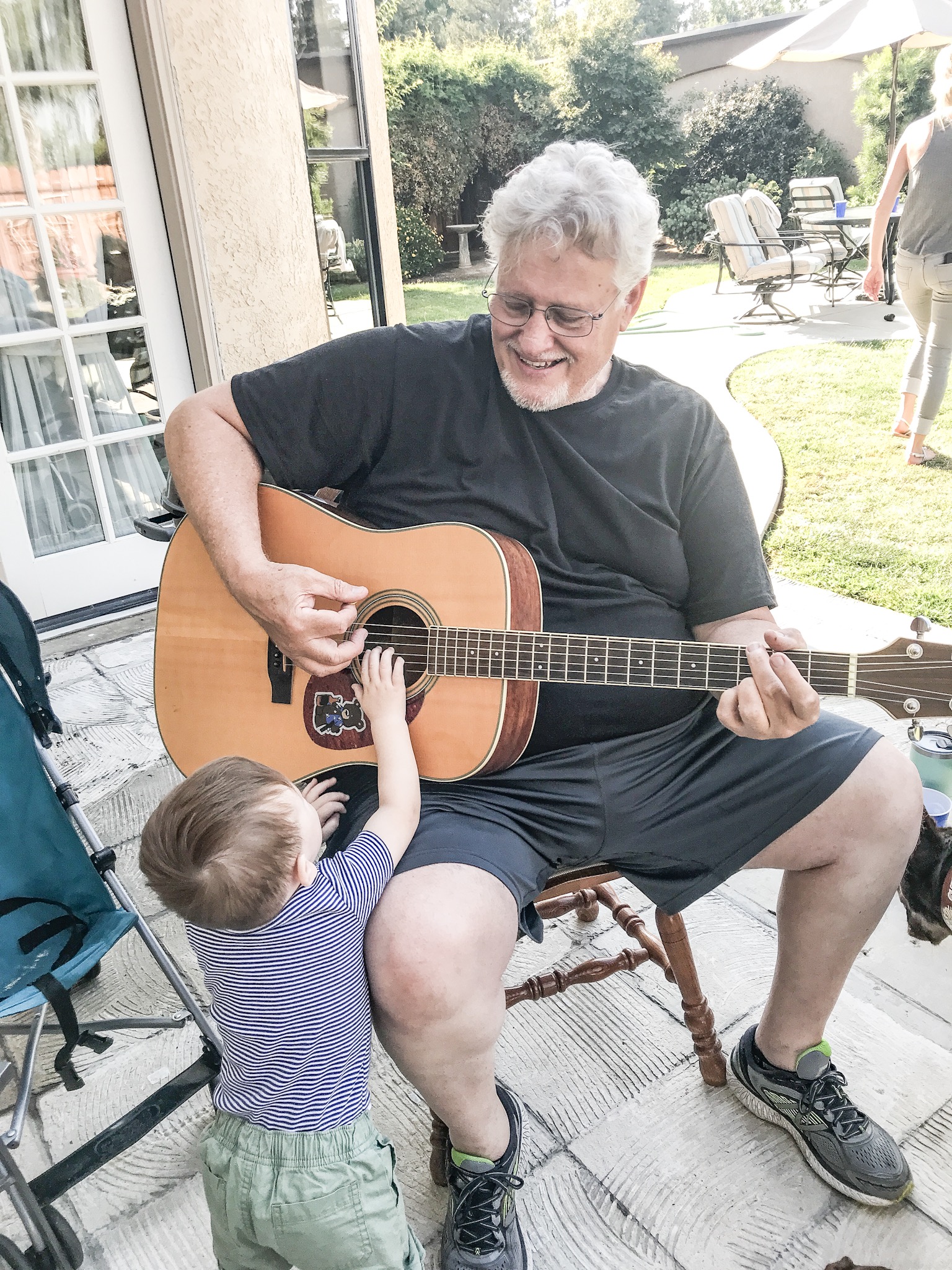 Elliot enjoying Papa’s playing.