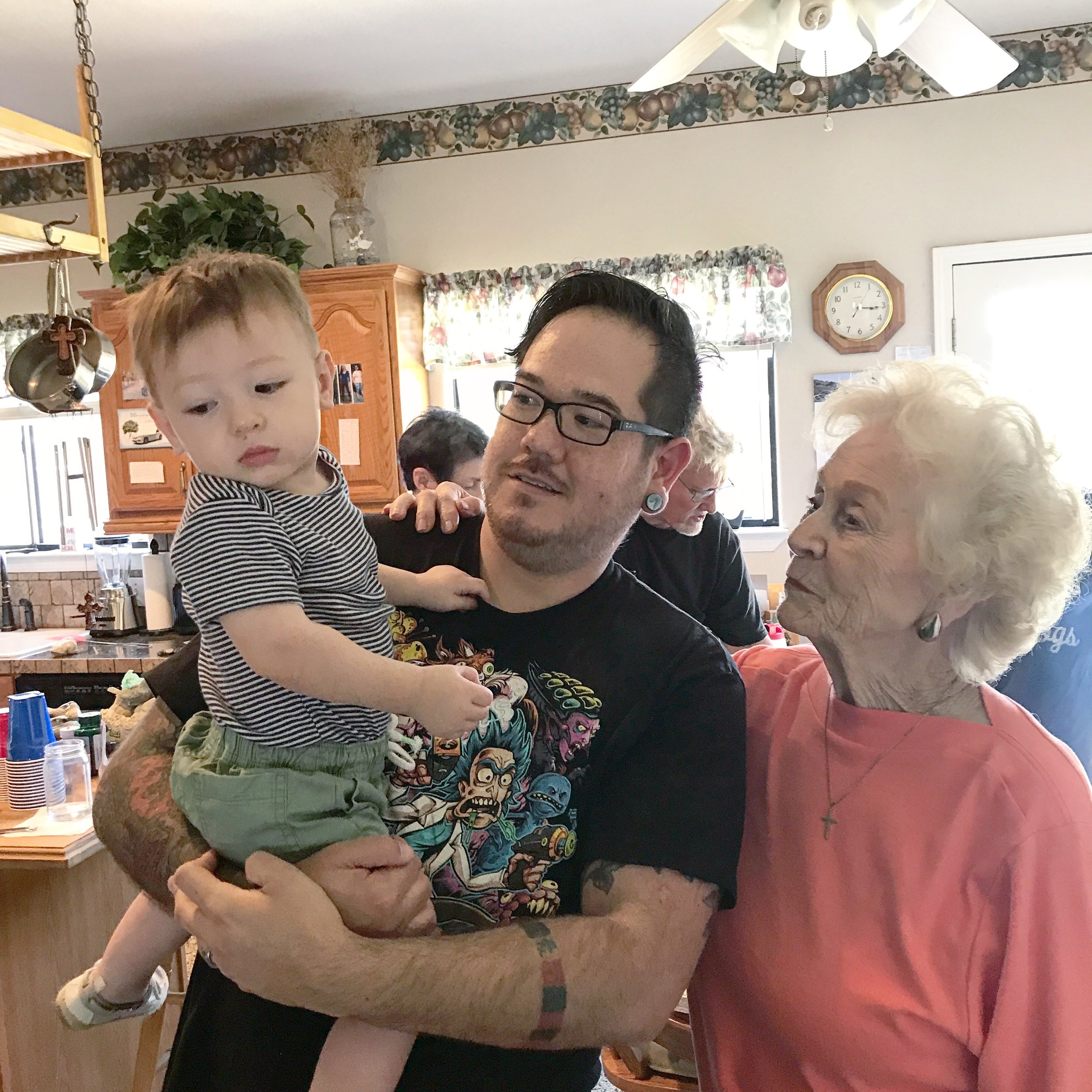 Great-Grandma meeting the littlest turd for the first time.