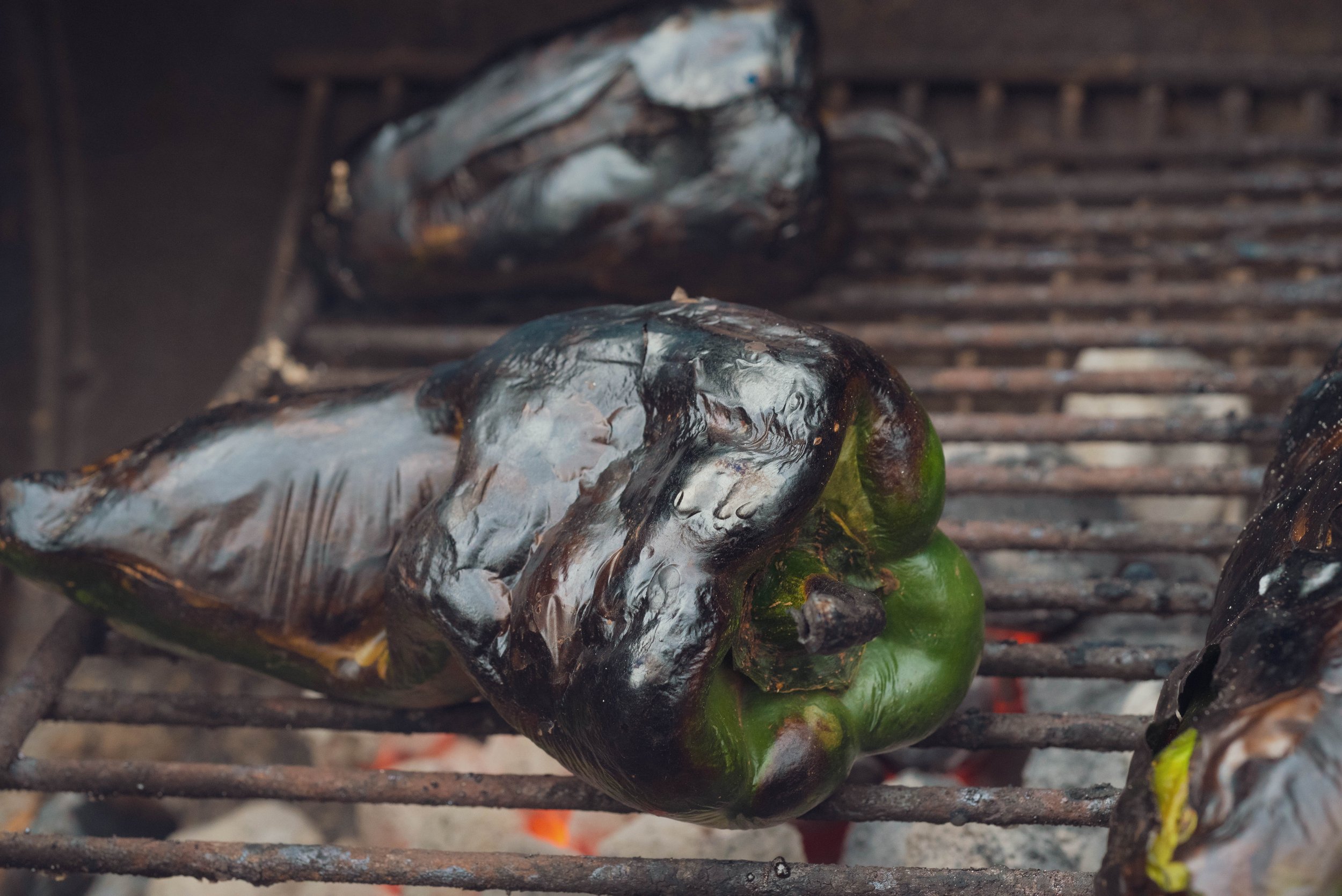 Deeply blackened skins make for easier peeling and add a deep smokey flavor to the final sauce.
