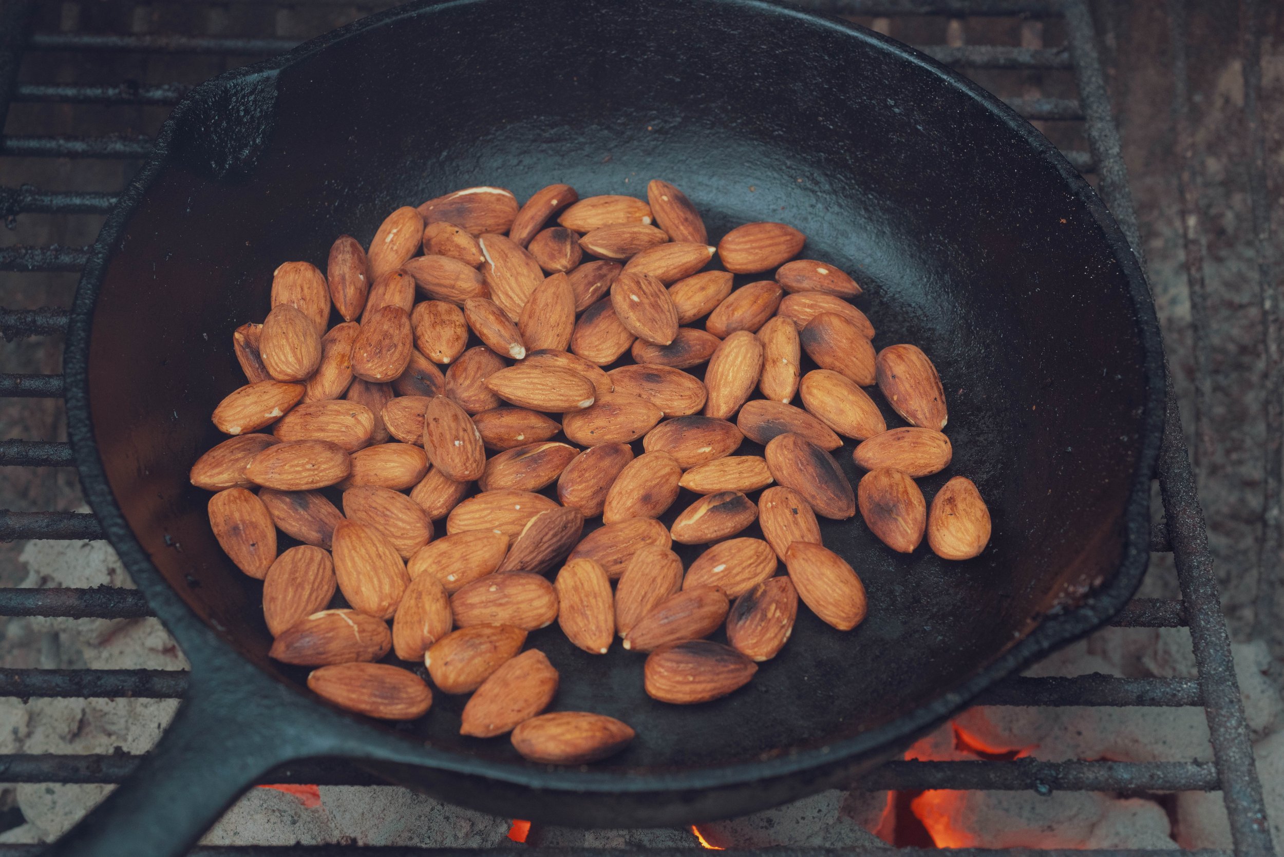 Roasting the almonds to a very slightly burned state is key to furthering the smokey quality to the dish.
