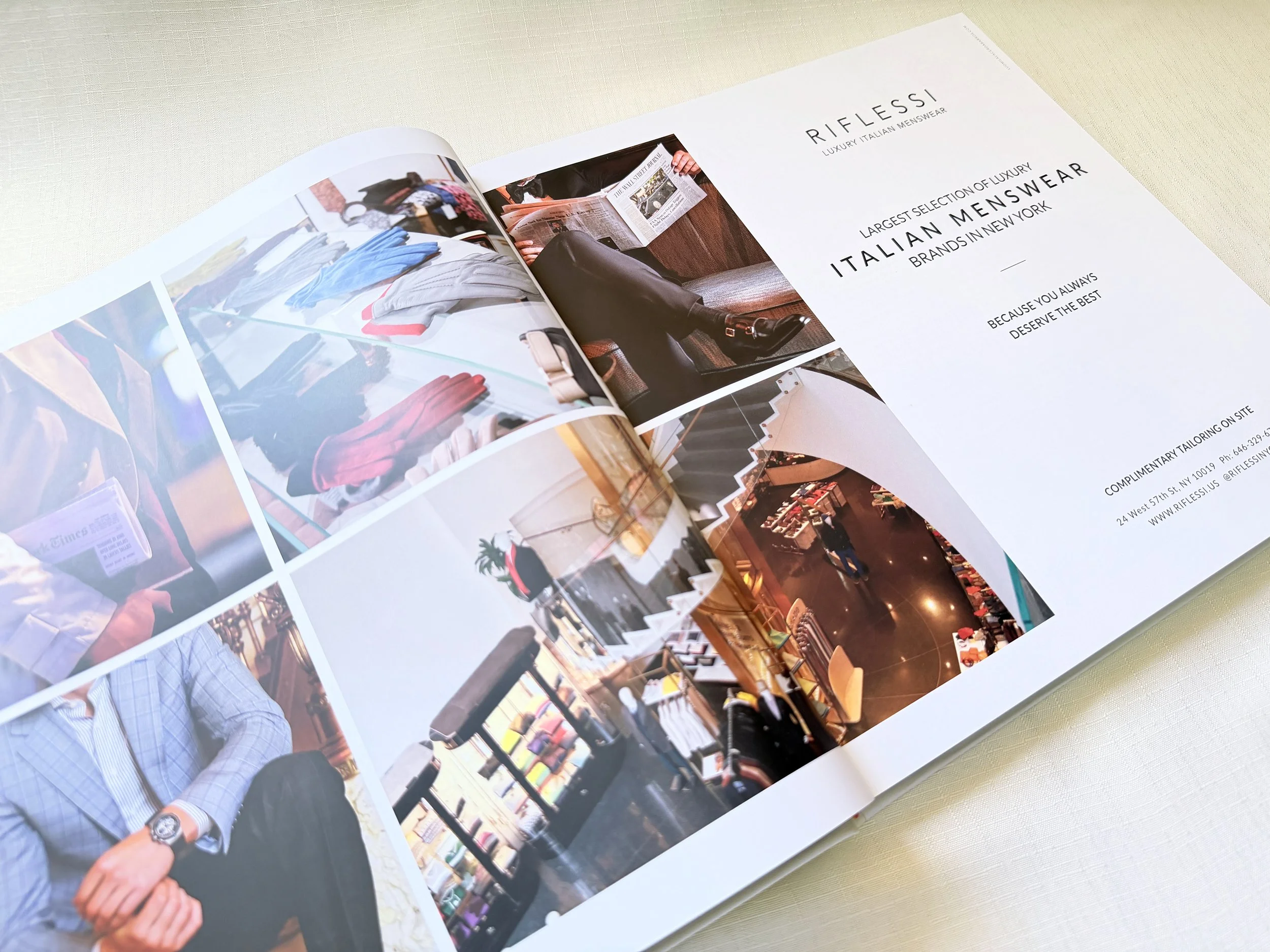 Open magazine showing photos of clothing and store interior, with text about Italian menswear and a person reading a newspaper.