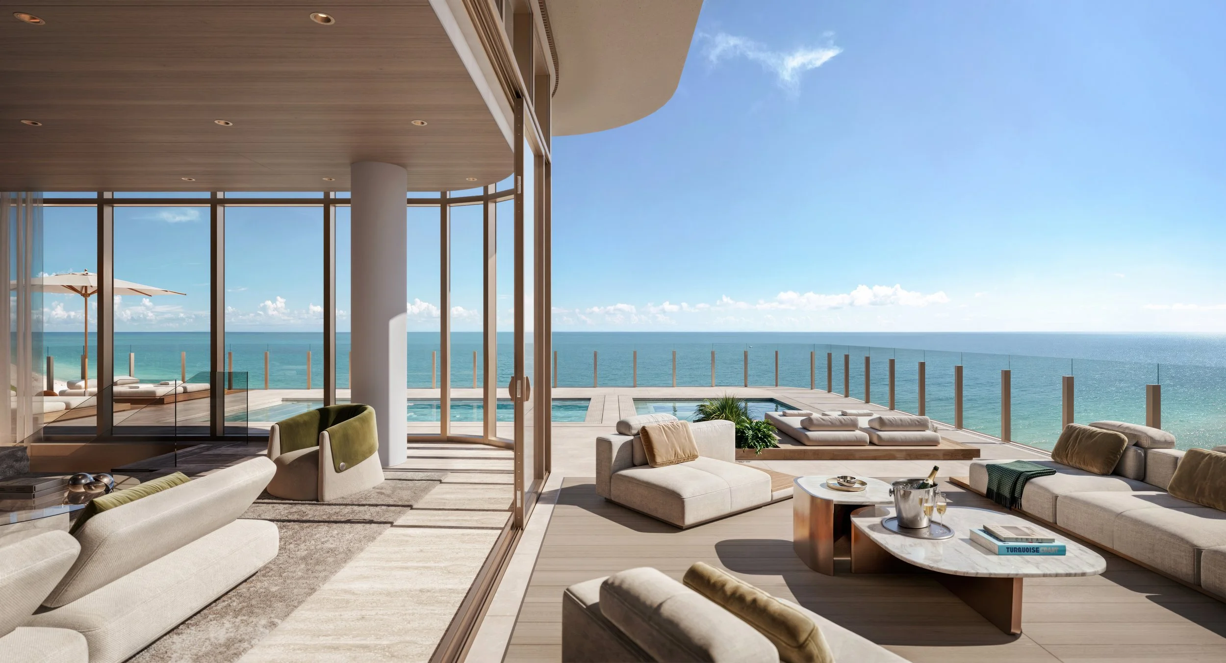 Luxury modern living room with floor-to-ceiling windows overlooking the ocean, furnished with beige sofas, chairs, and a marble coffee table.