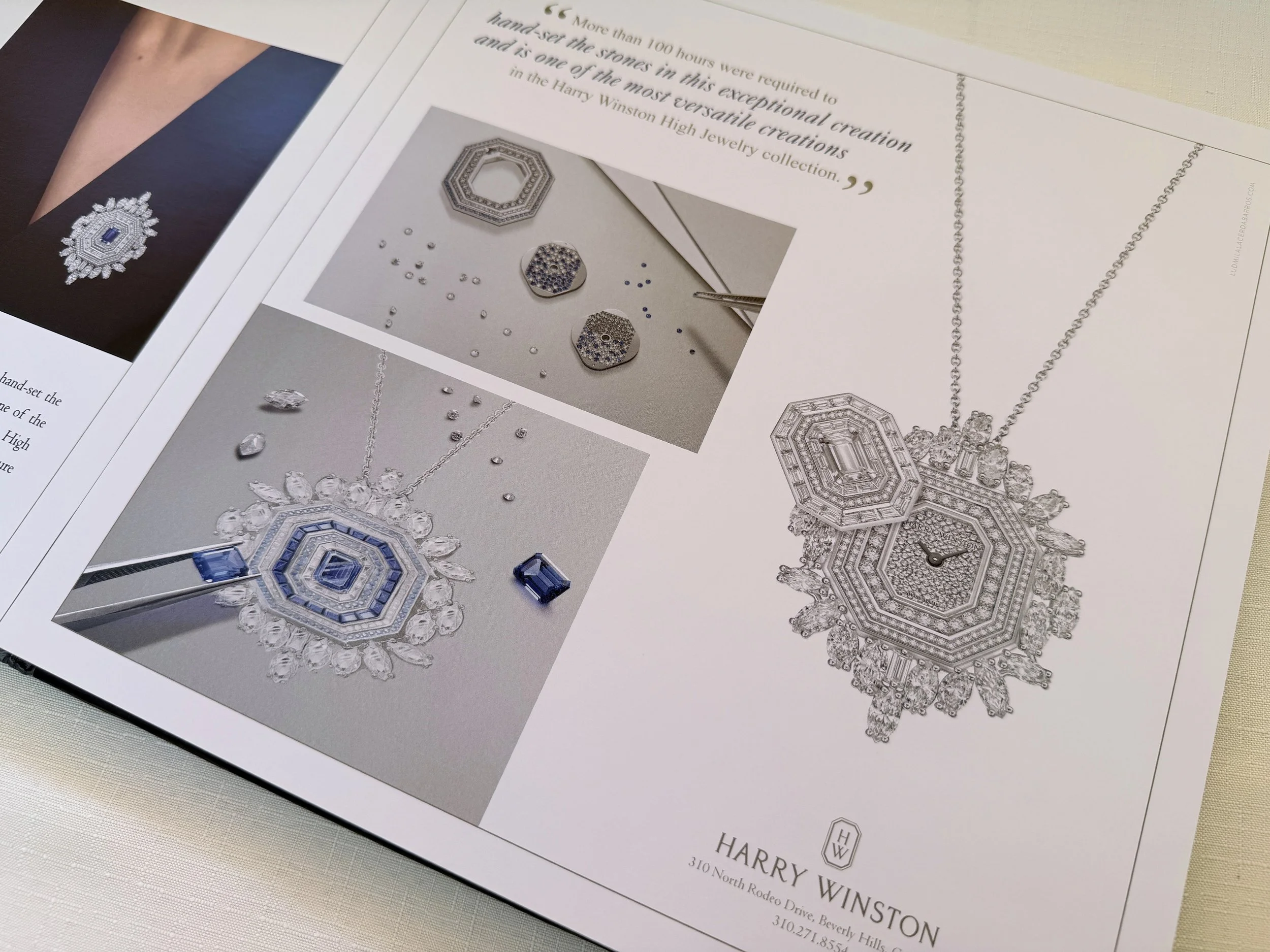 Photograph of a jewelry catalog page featuring diamond jewelry, including a large diamond necklace, earrings, and a watch with intricate designs and gemstone accents.