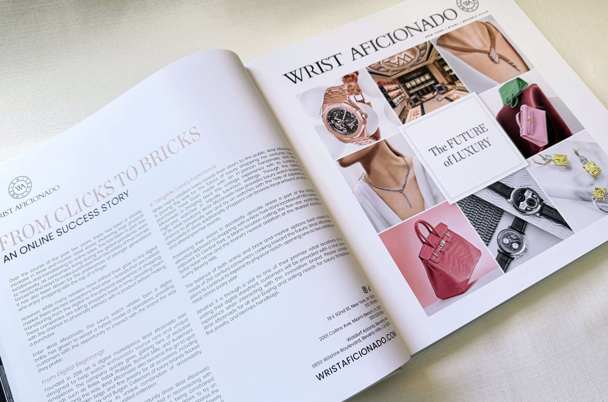 Open book pages displaying luxury jewelry and watches, including necklaces, rings, earrings, and various wristwatches, with headlines about luxury and fashion.