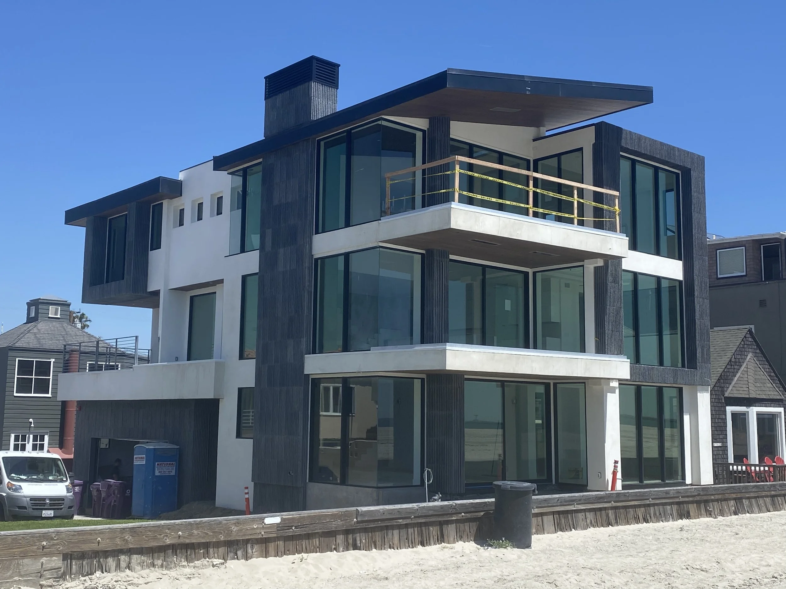 New oceanfront home on Seaside Walk, Long Beach, with glass balconies
