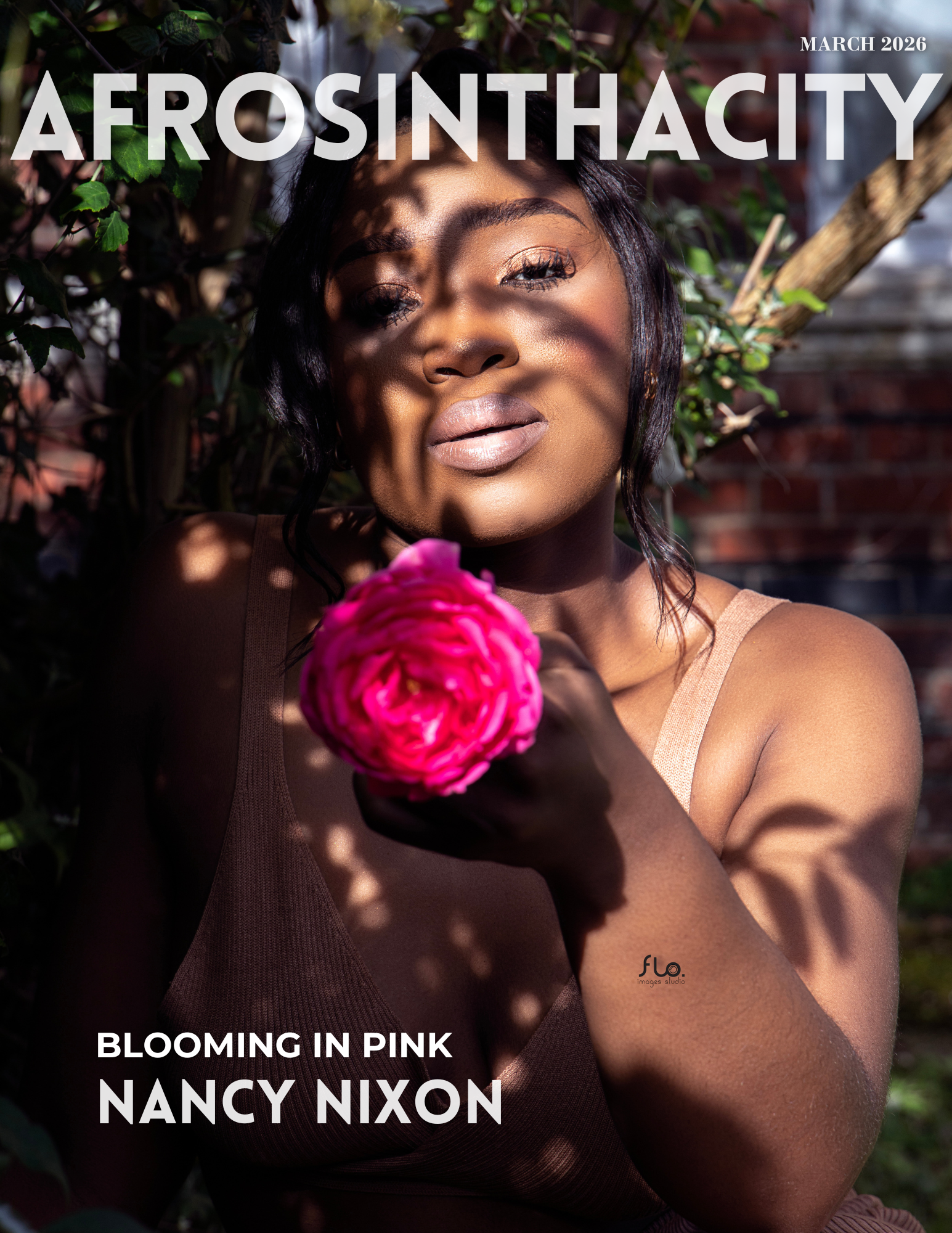 Image of Nancy Nixon in a spring shoot with pink rose as accent