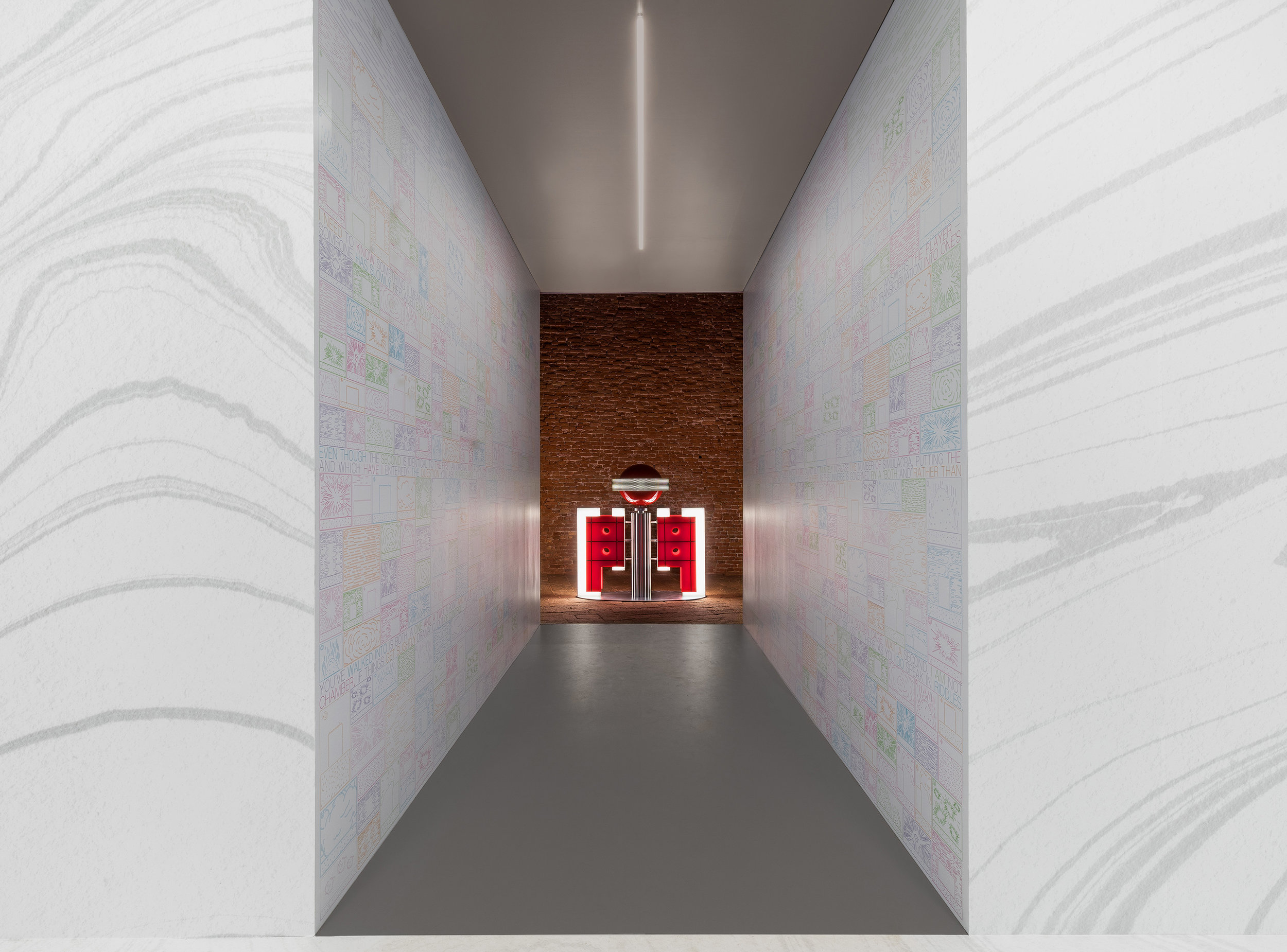  Room 7. A narrow hallway leads visitors out of the exhibition space. Along the walls are cartoon images of a cell exploding. Text by Elena Sorokina lines the walls in two horizontal bands. 