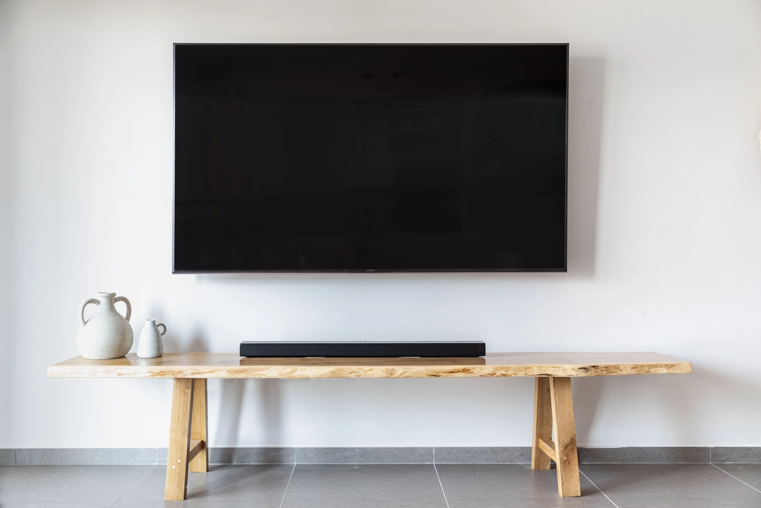 TV Mounting Cost (2026): Wall Mount Installation Prices