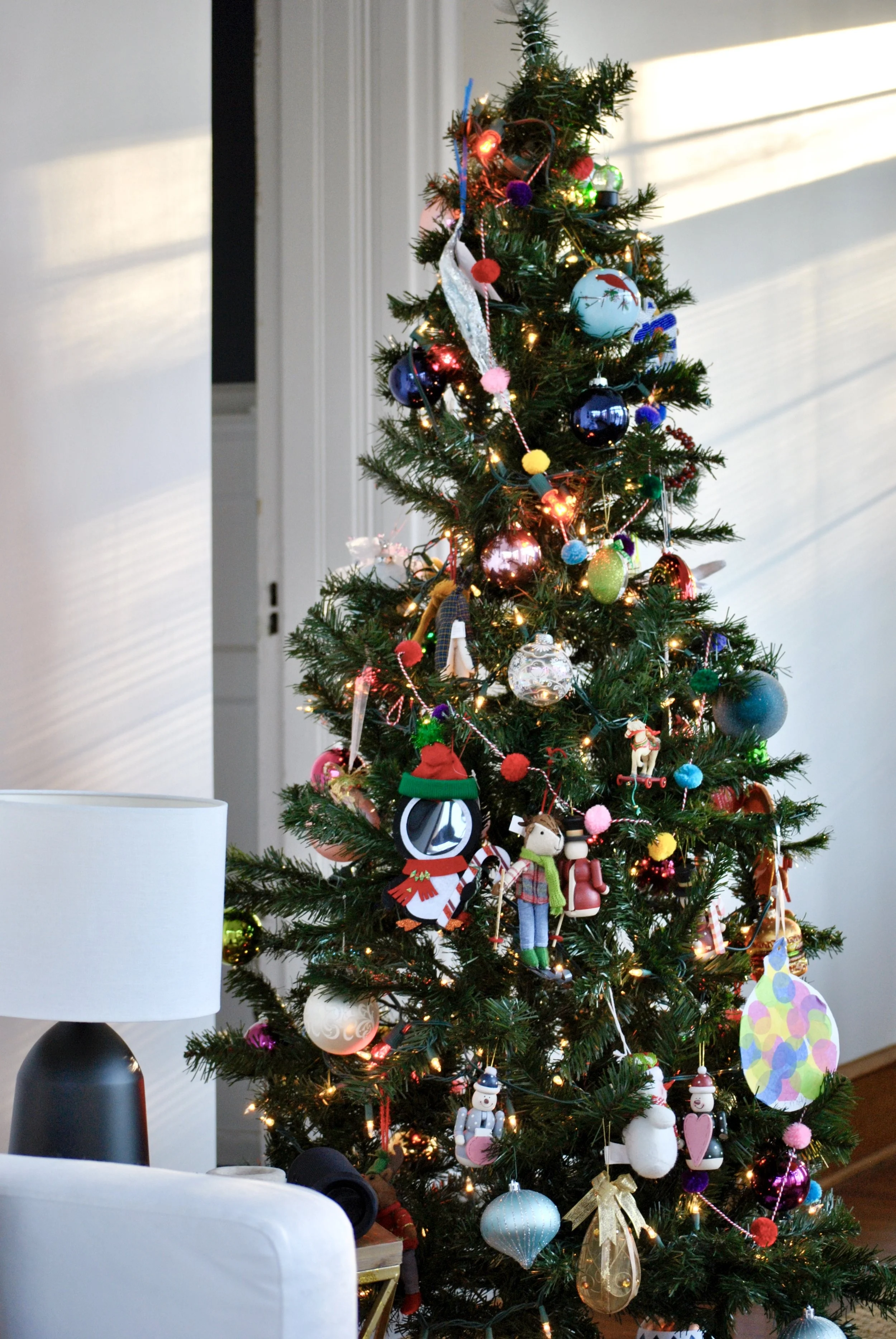 Kids Christmas Tree filled with fun colorful ornaments | Sharp + Grey Interiors