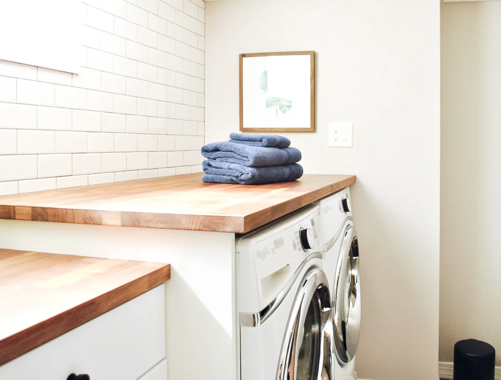 Laundry room with butcher block counter tops | Sharp + Grey Interiors