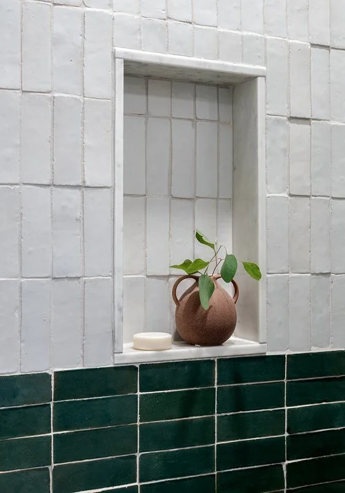 Emerald tile in bathroom walk-in shower.