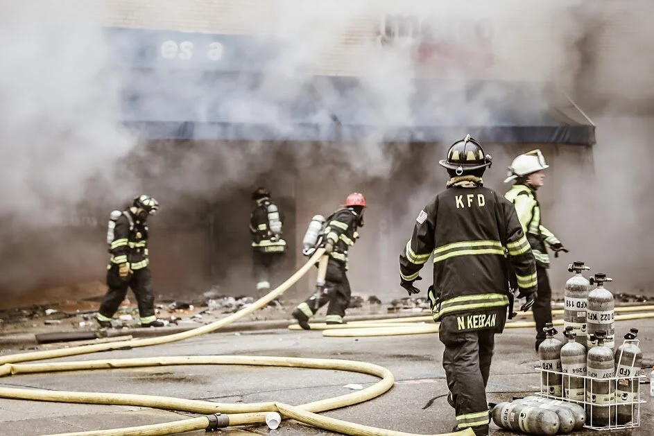 Firefighters putting out fires after a night of rioting in Kenosha.