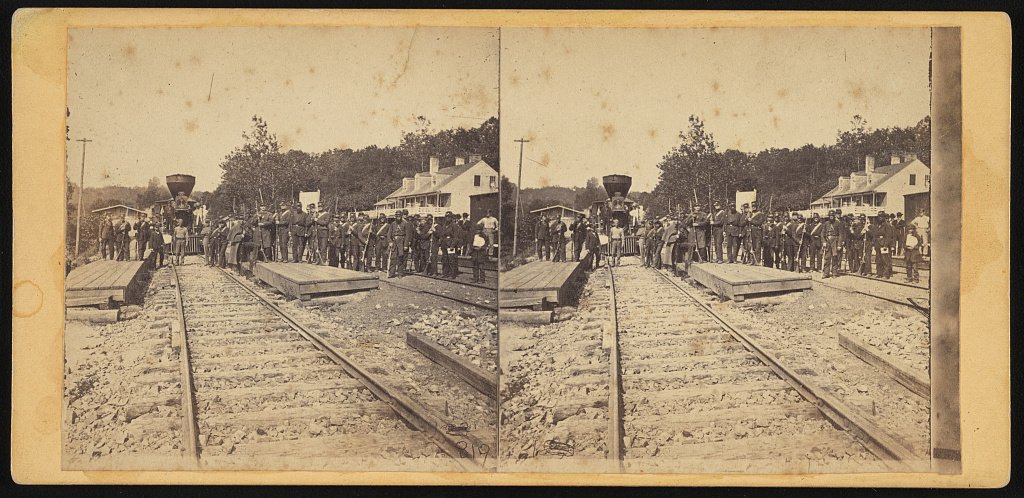 Unidentified soldiers of Massachusetts Infantry Regiment in Union uniforms with swords on the platforms at Relay House train station on the Baltimore & Ohio Railroad in Halethorpe, Maryland] : E HT Anthony.jpeg
